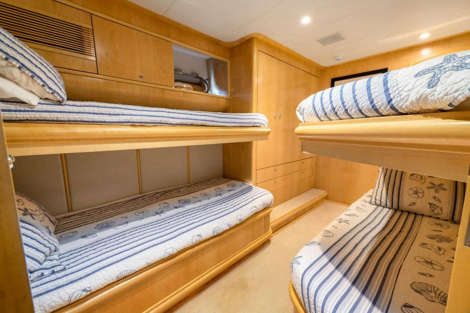 bunk beds in a room aboard BERADA Yacht for Sale