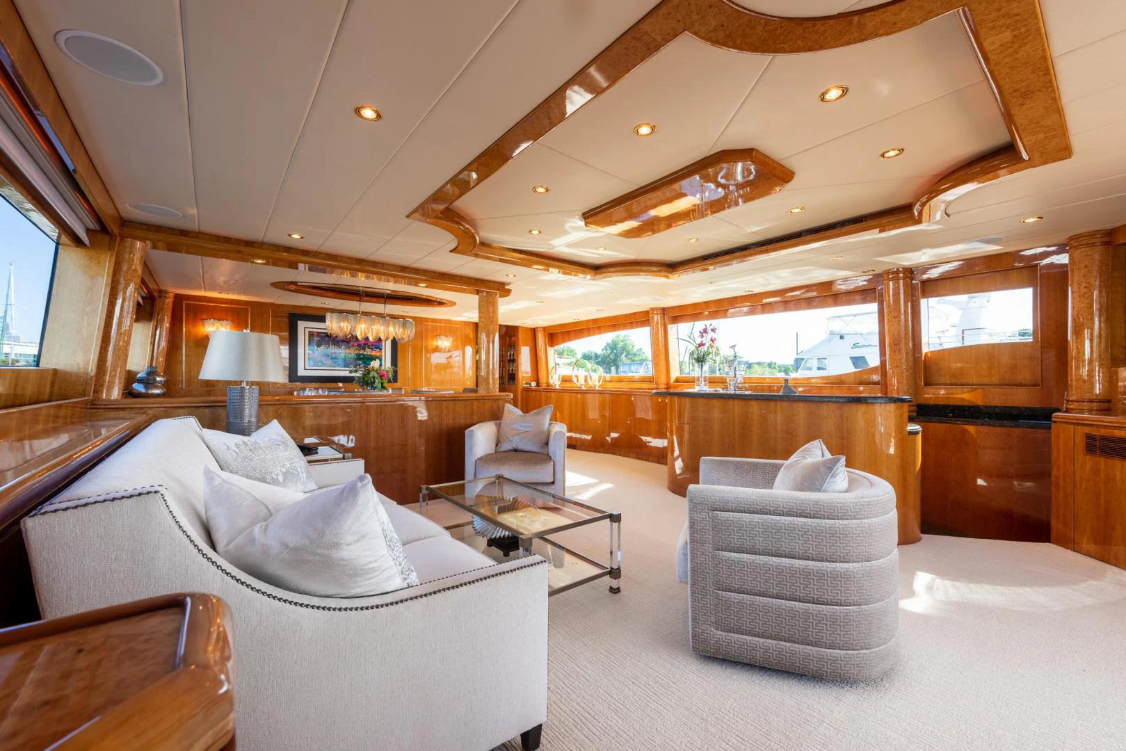 a room with a bed and a table aboard TRITON Yacht for Sale