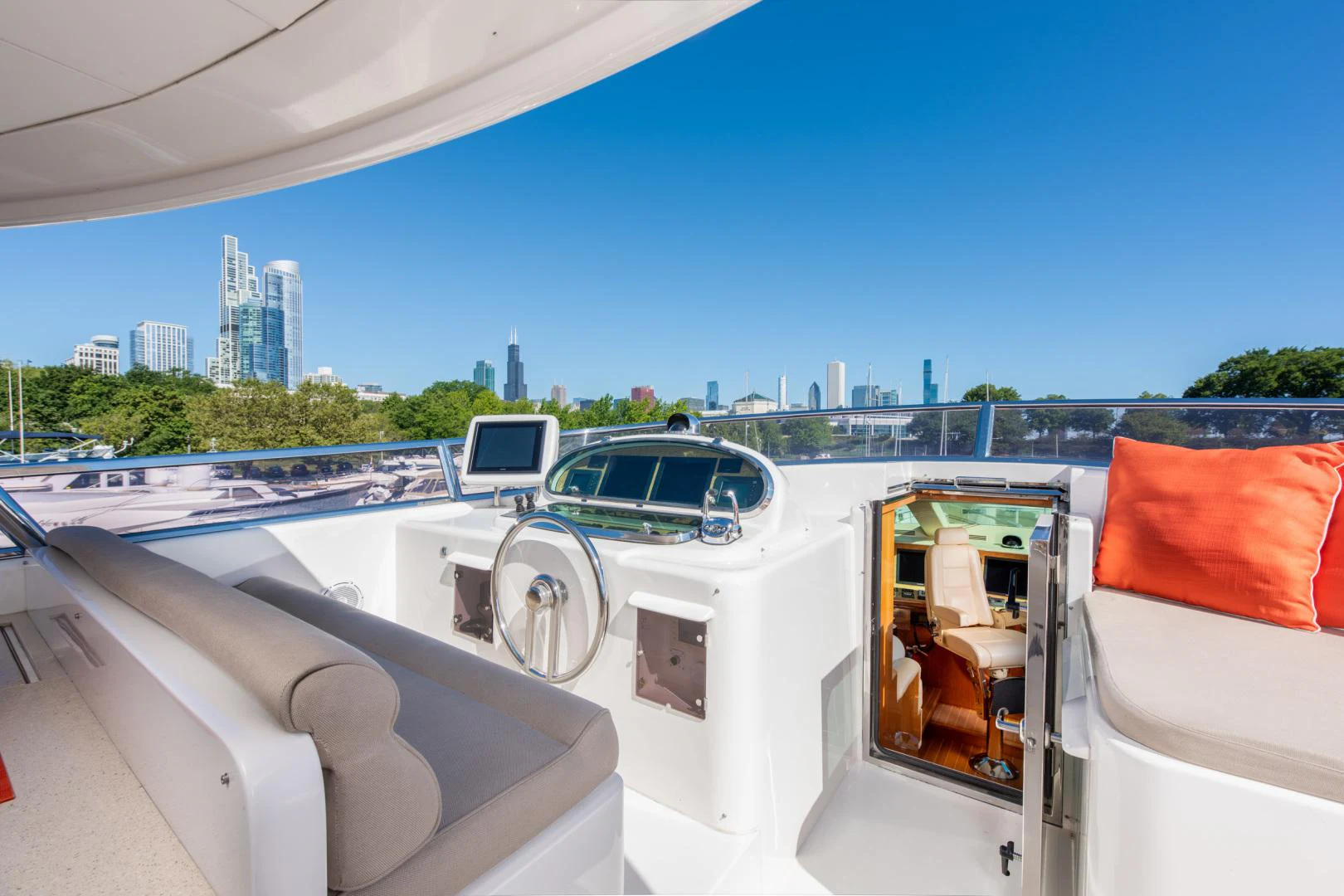 a view of a city from a boat aboard TRITON Yacht for Sale