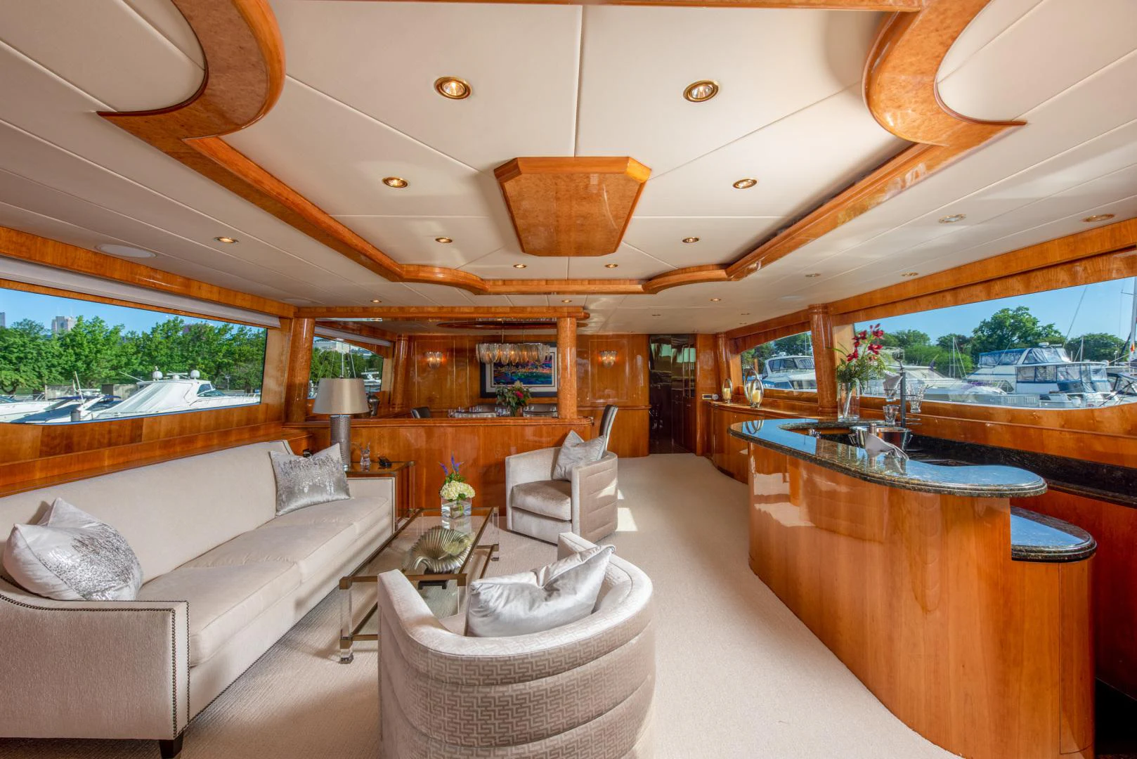 a living room with a large jacuzzi tub aboard TRITON Yacht for Sale
