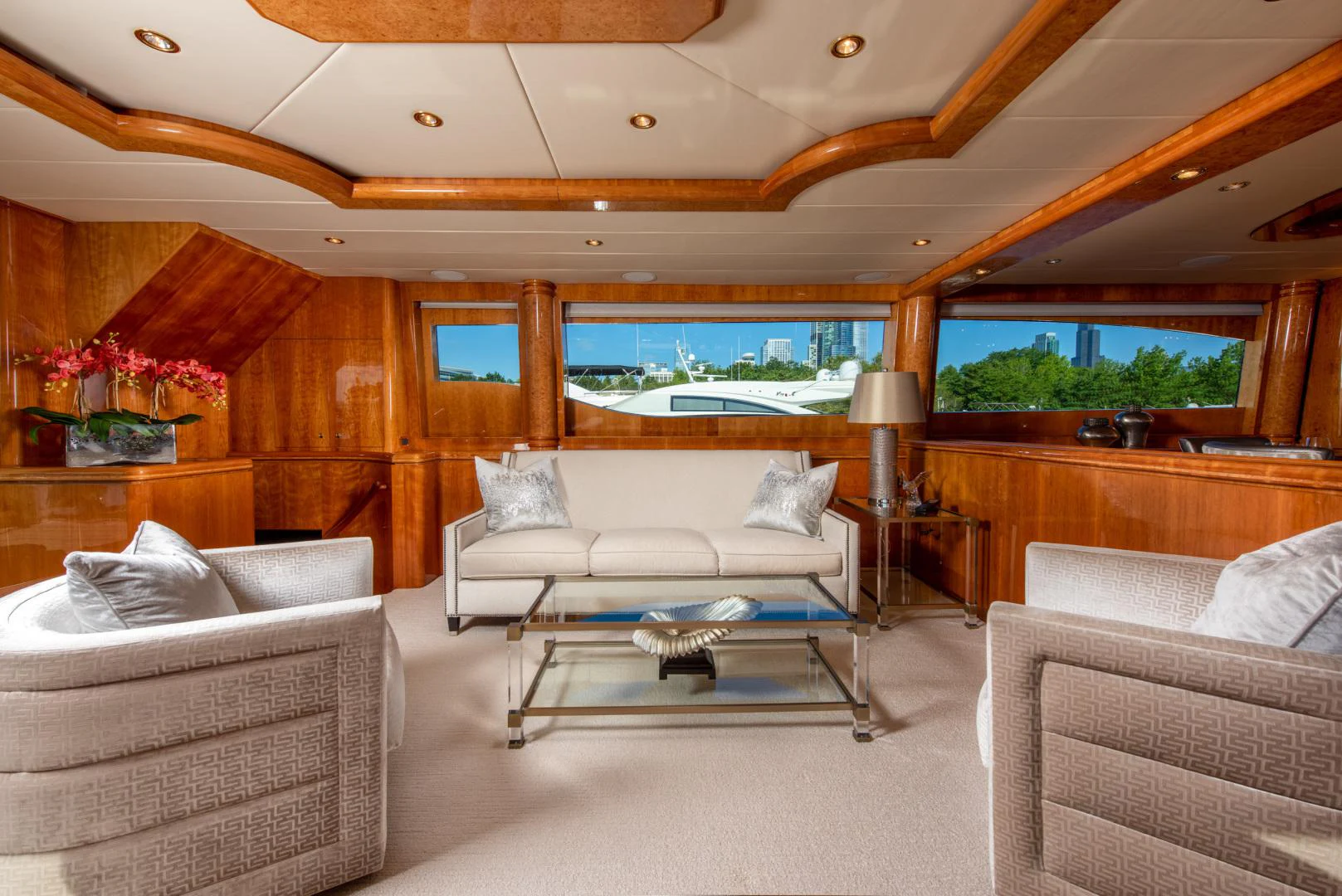 a living room with a large window aboard TRITON Yacht for Sale
