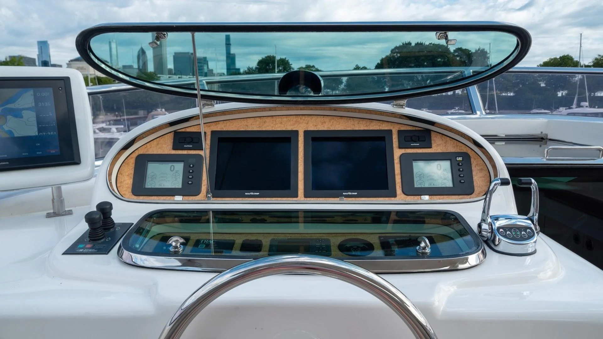 the front of a white car aboard TRITON Yacht for Sale