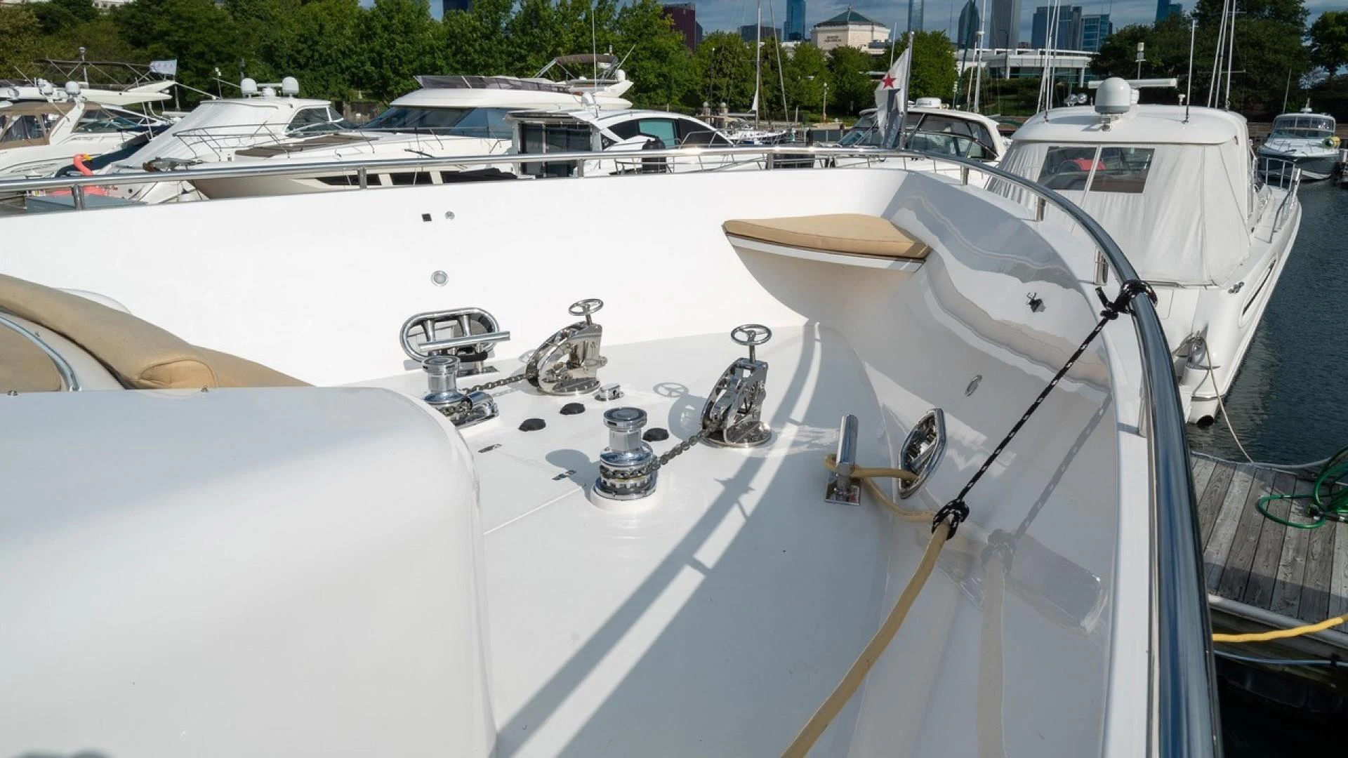 a white boat with a faucet and a faucet on the front aboard TRITON Yacht for Sale