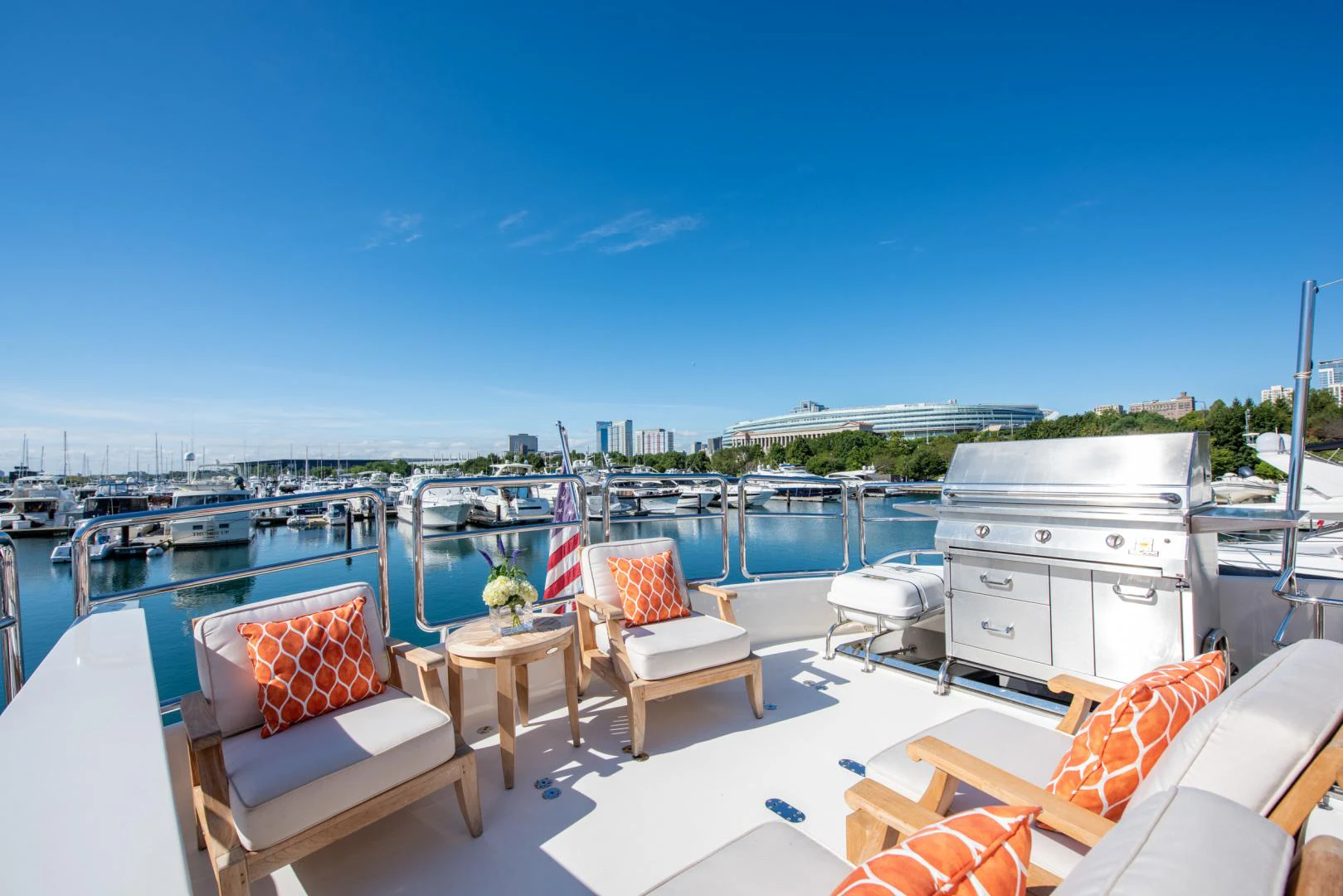 a deck with chairs and tables on it aboard TRITON Yacht for Sale