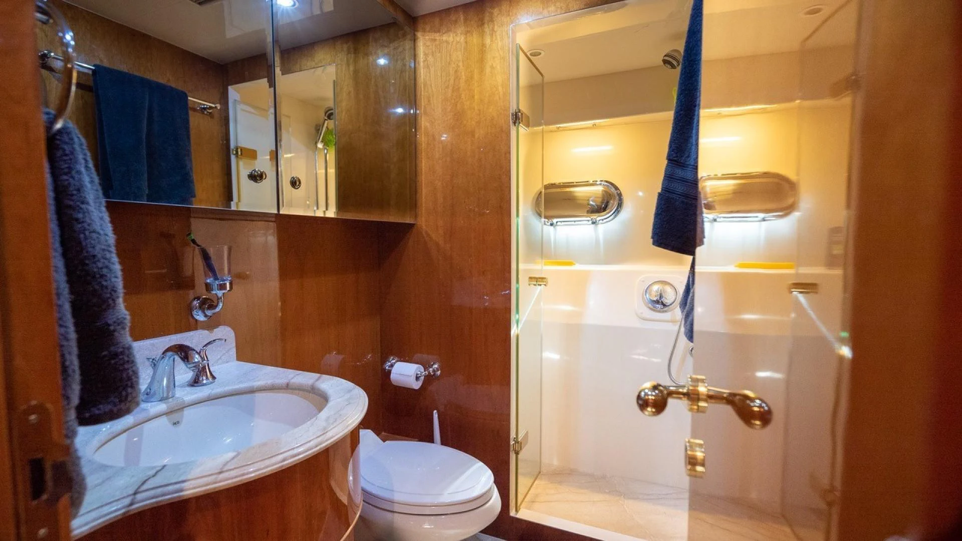 a bathroom with a sink and toilet aboard TRITON Yacht for Sale