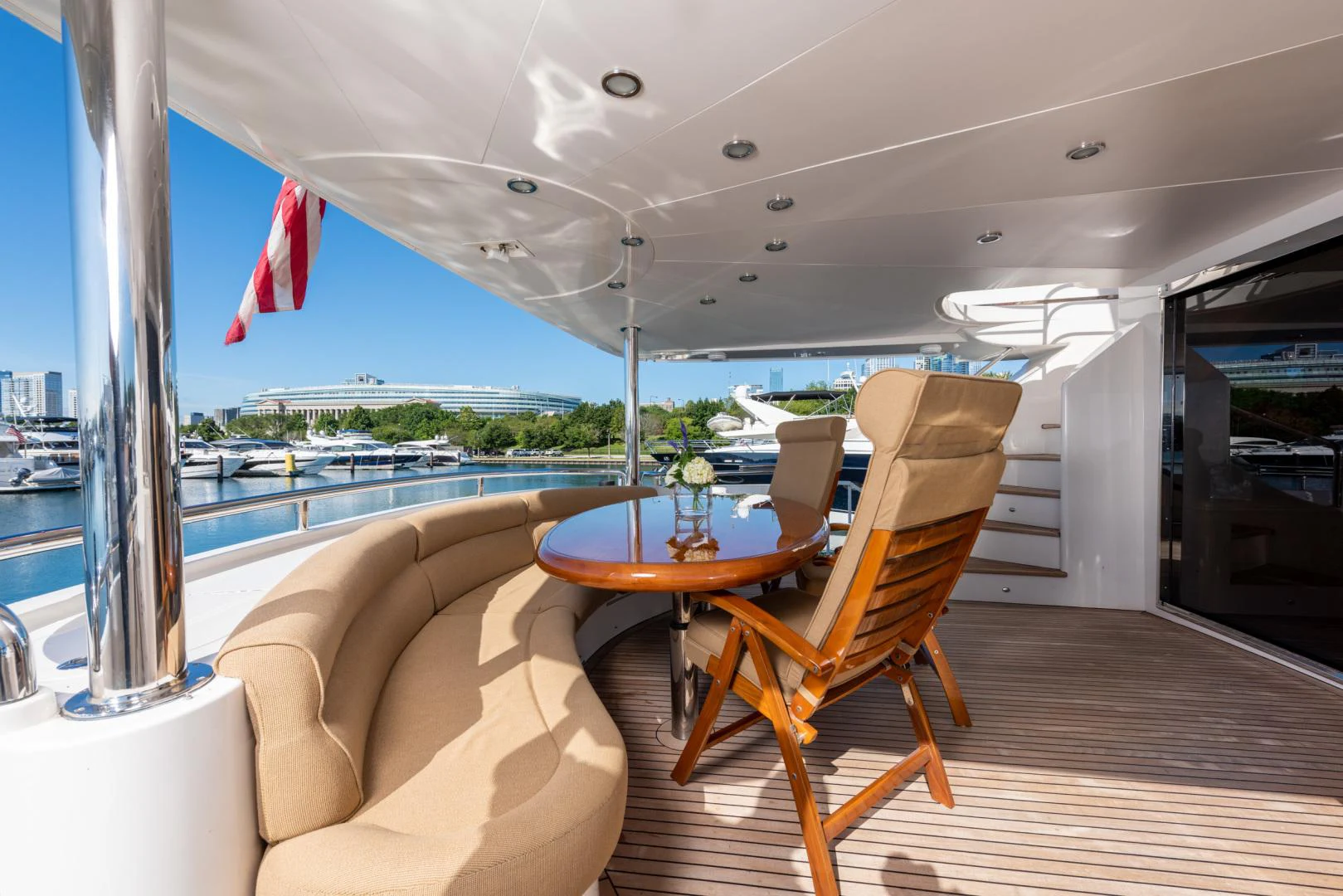 a room with a table and chairs aboard TRITON Yacht for Sale