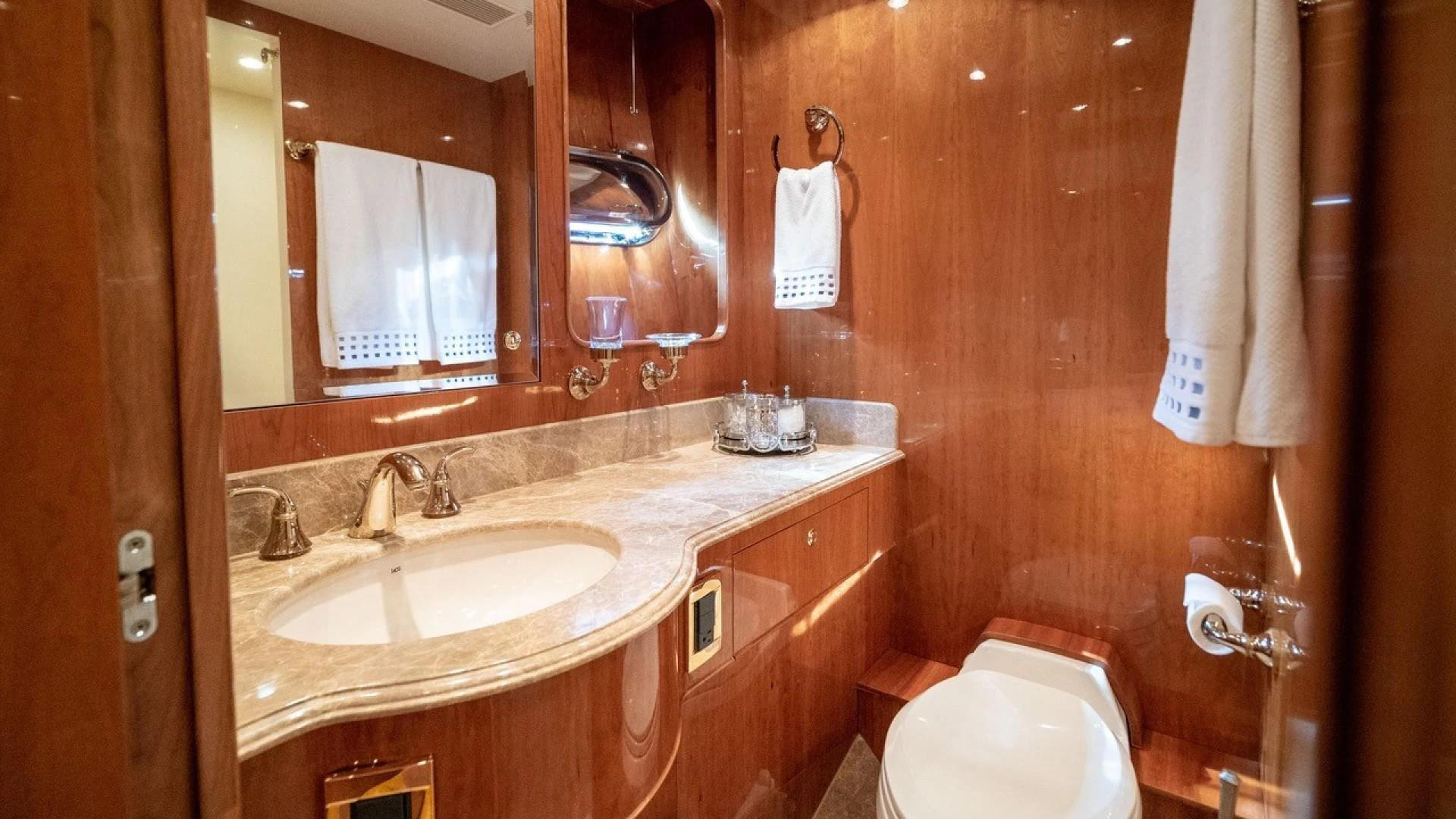 a bathroom with a sink and a toilet aboard TRITON Yacht for Sale
