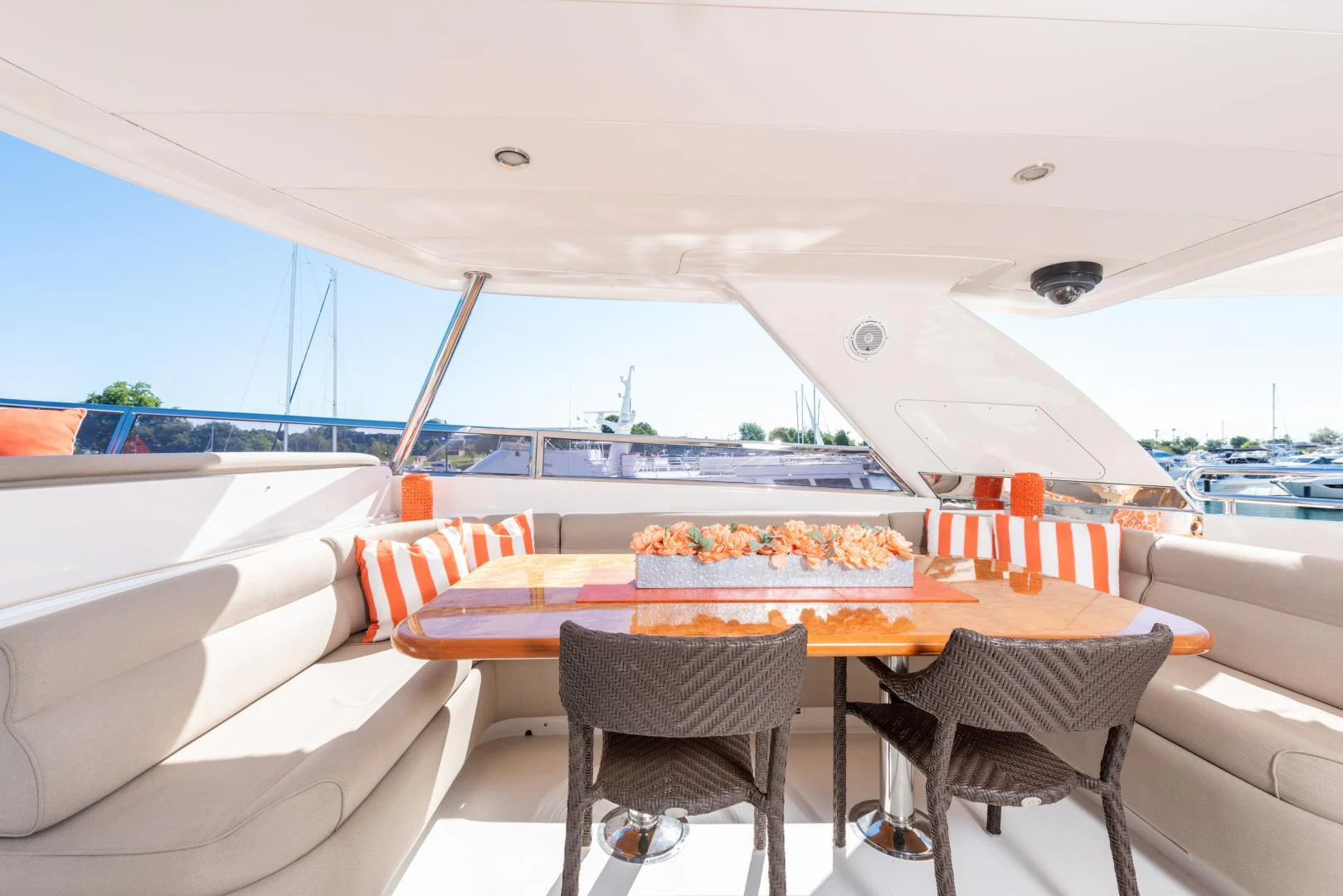 a table with a pizza on it aboard TRITON Yacht for Sale