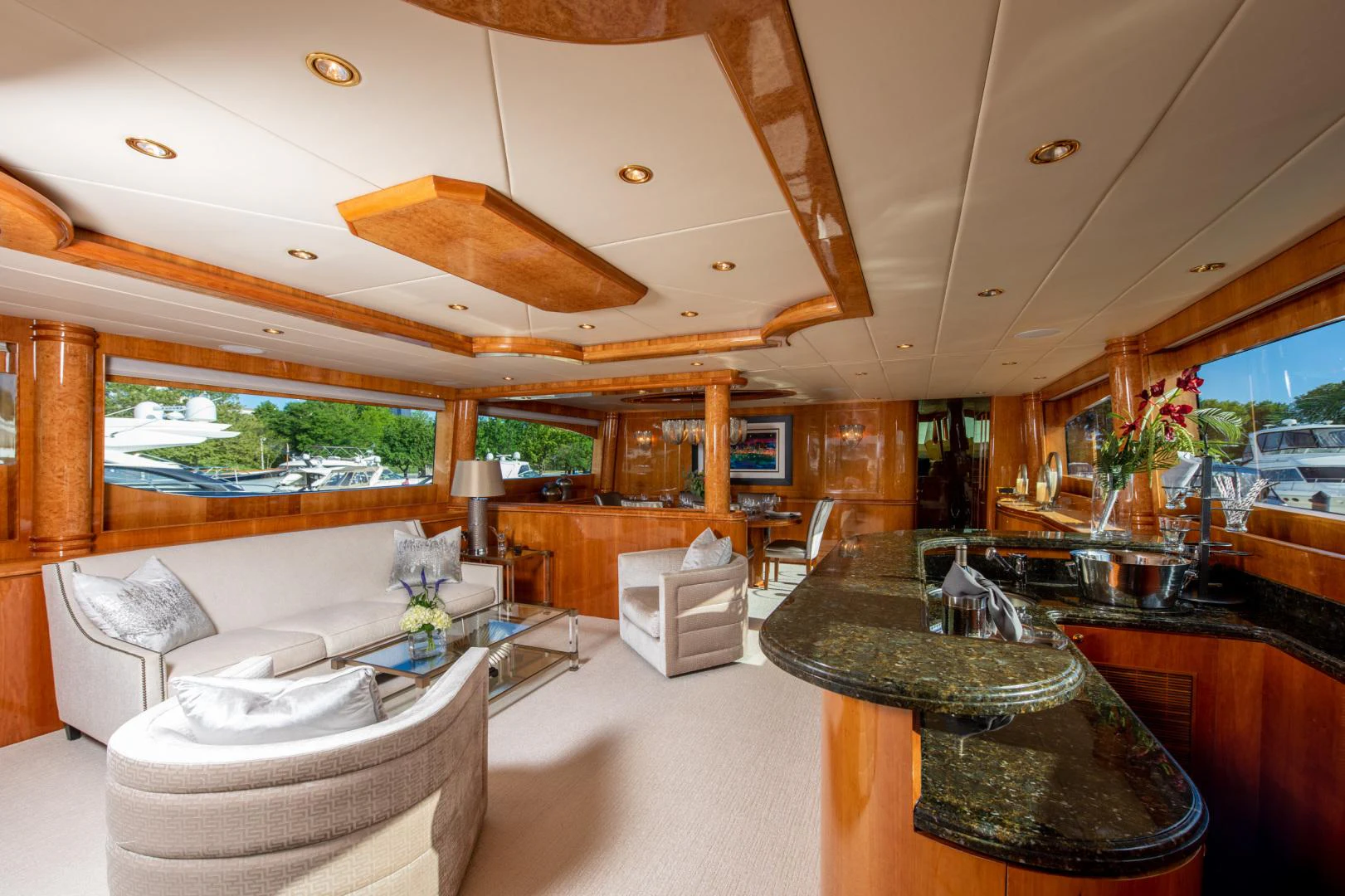 a living room with a large open window aboard TRITON Yacht for Sale