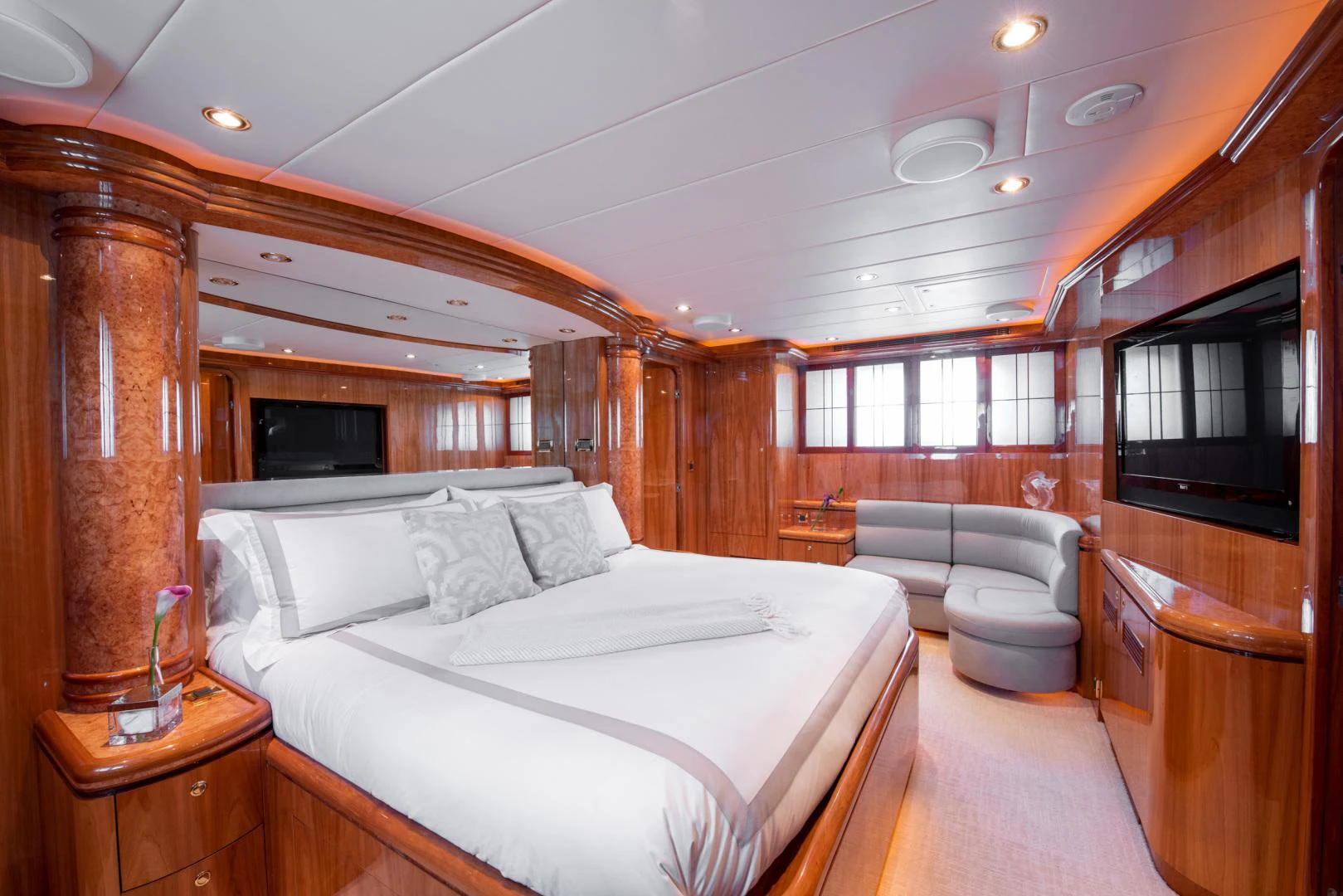 a large bedroom with a bed aboard TRITON Yacht for Sale