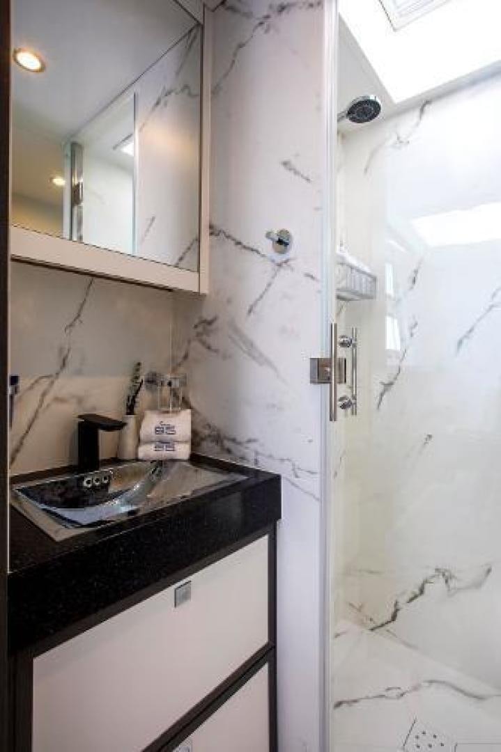 a sink in a bathroom aboard CARTOUCHE Yacht for Sale