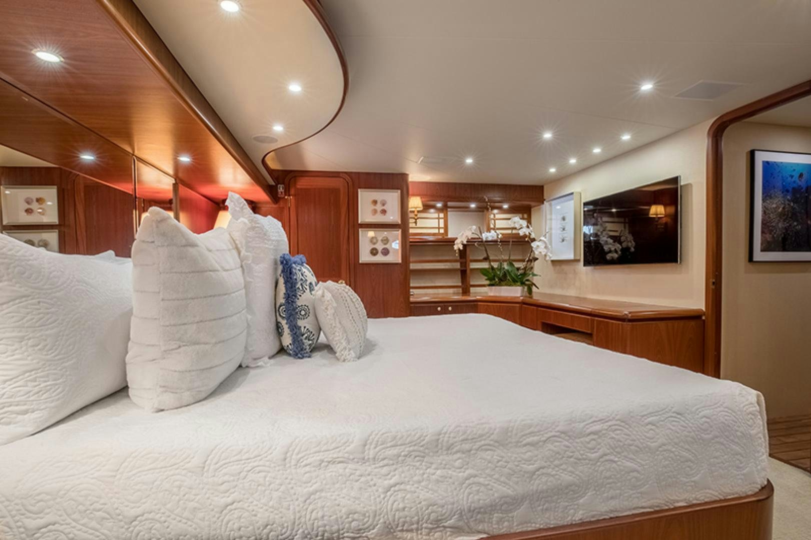 a bed with white sheets aboard FAN TAIL Yacht for Sale