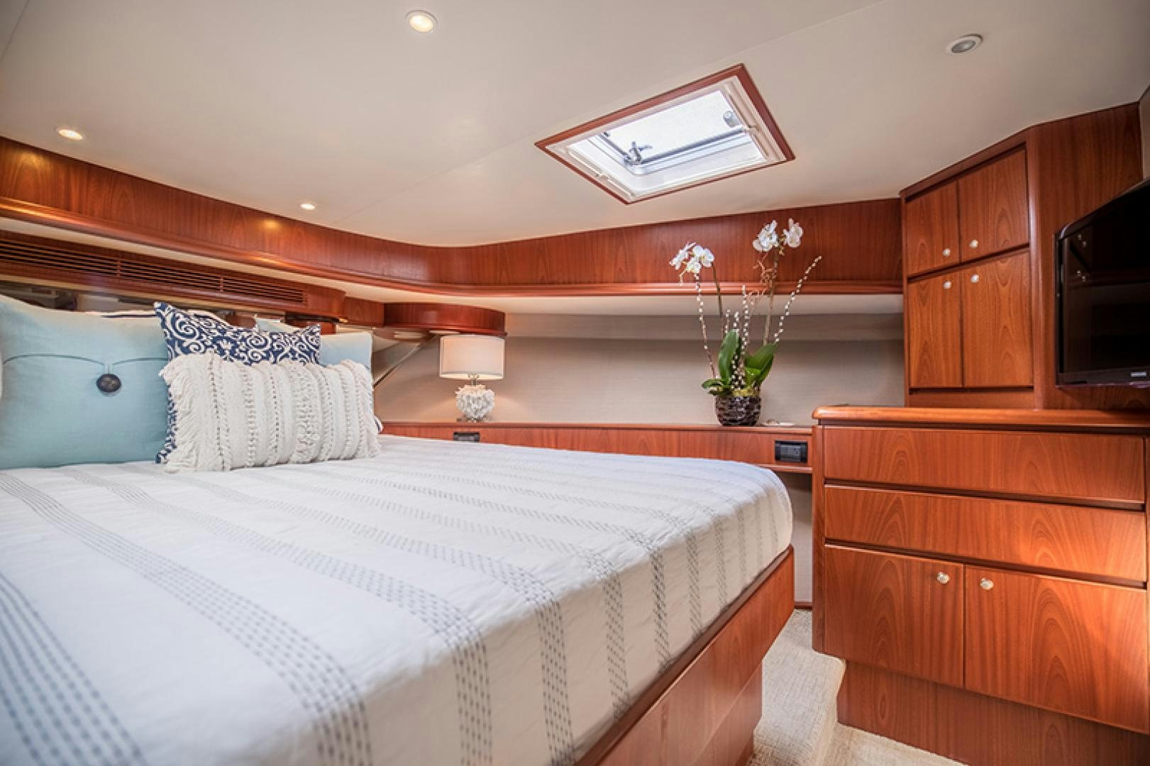 a bedroom with a large bed aboard FAN TAIL Yacht for Sale