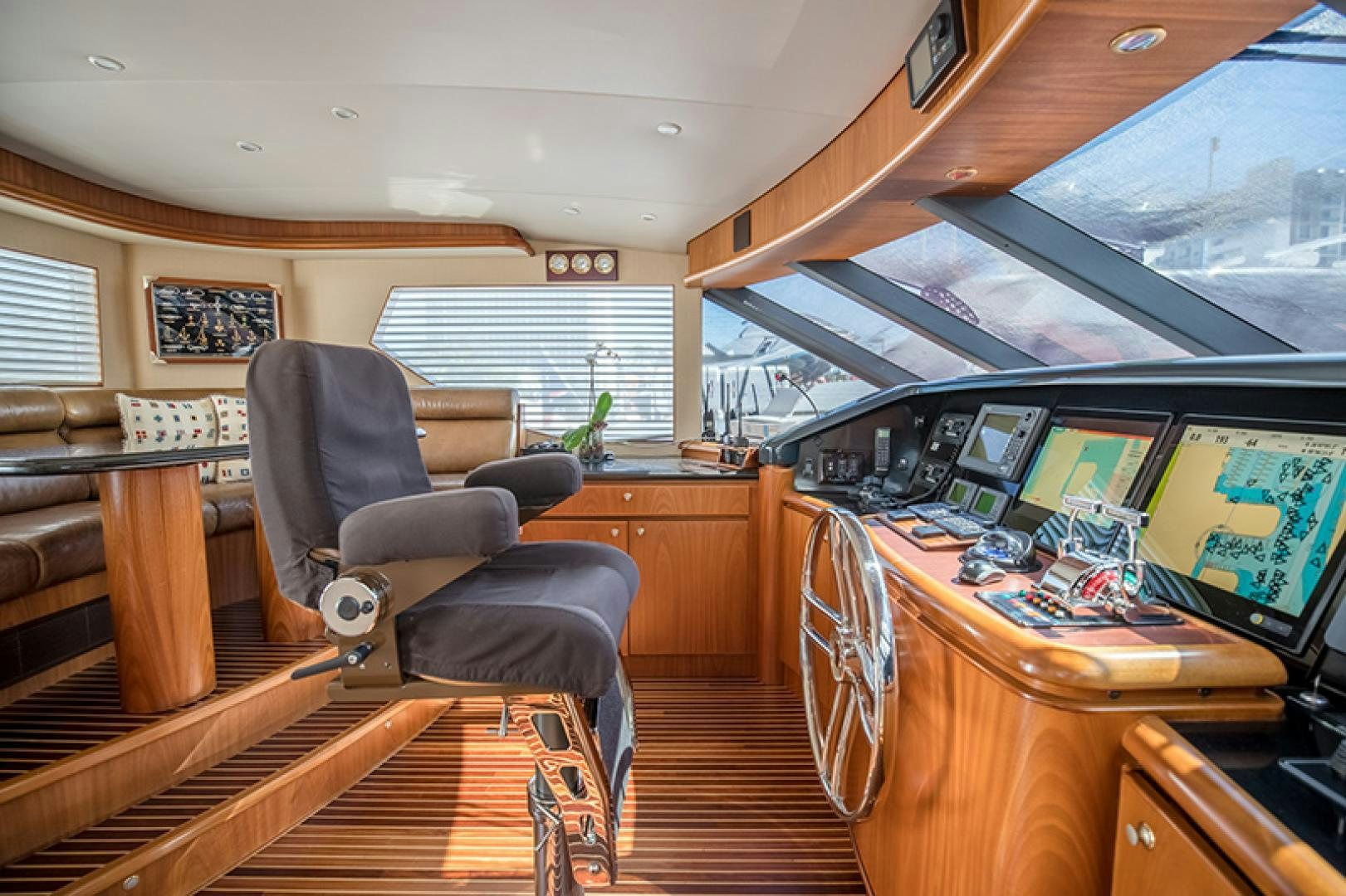 a room with a desk and chairs aboard FAN TAIL Yacht for Sale