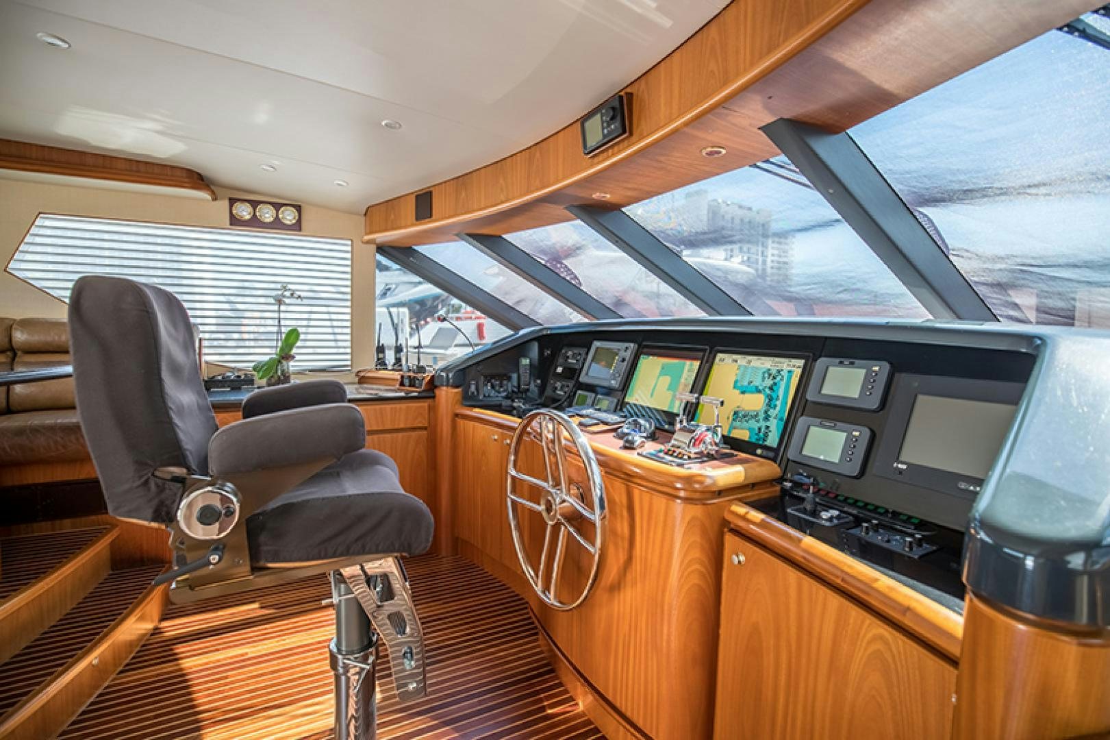 inside of a vehicle with a desk and computer aboard FAN TAIL Yacht for Sale