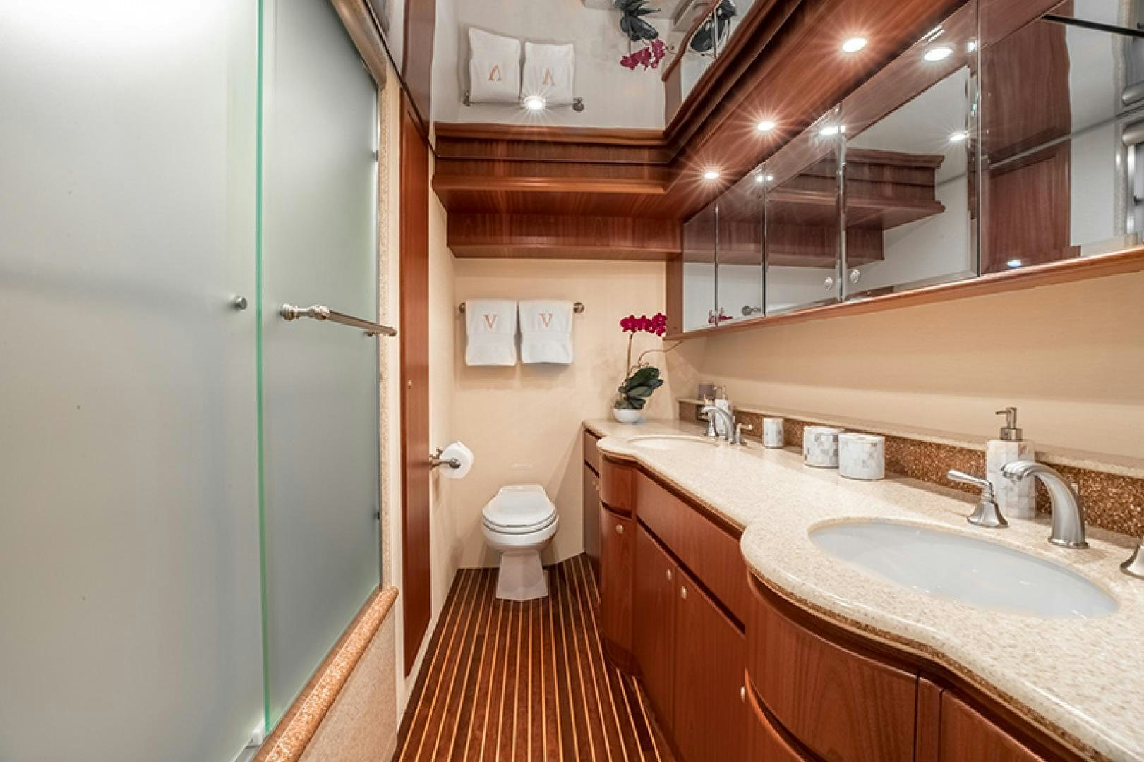 a bathroom with a sink and a toilet aboard FAN TAIL Yacht for Sale
