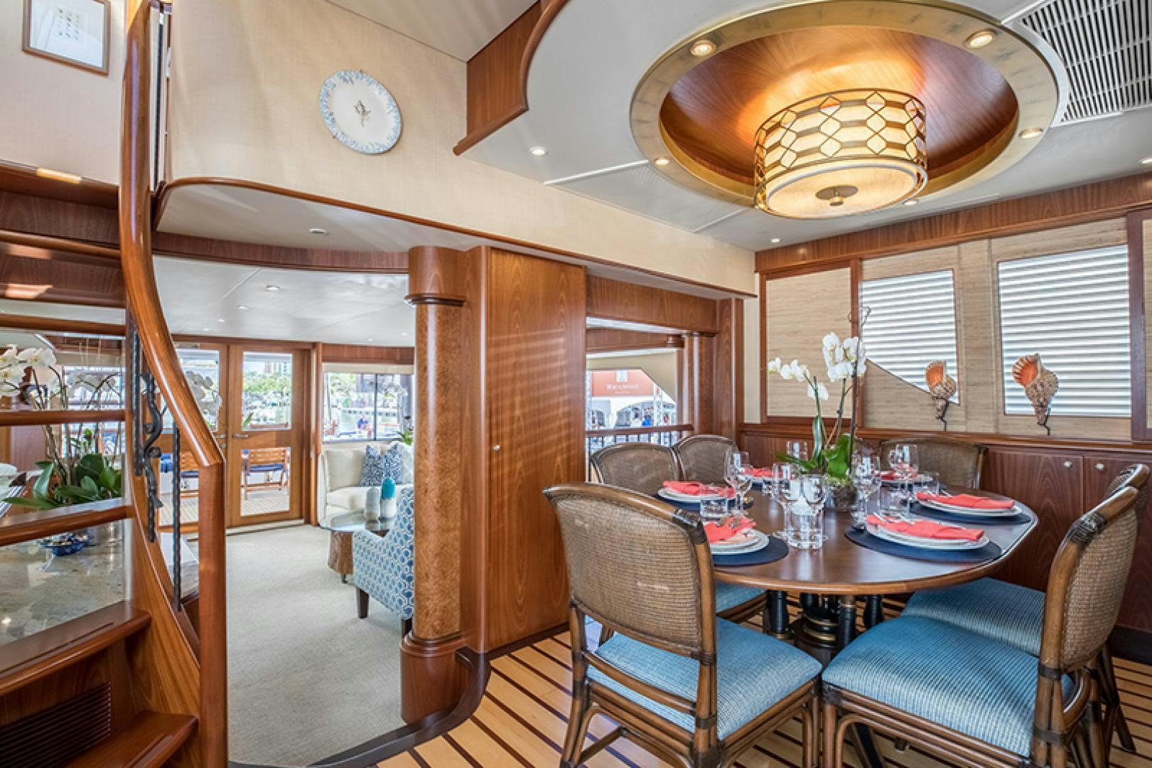 a dining room with a table and chairs aboard FAN TAIL Yacht for Sale