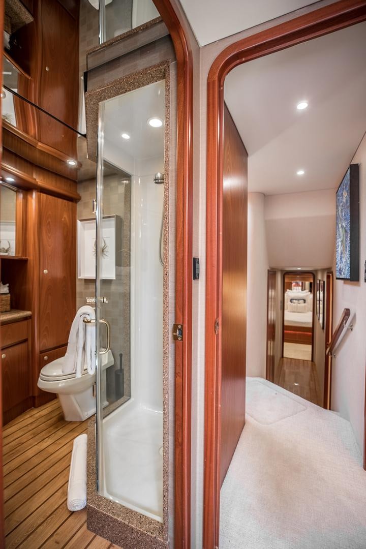 a bathroom with a shower and toilet aboard FAN TAIL Yacht for Sale