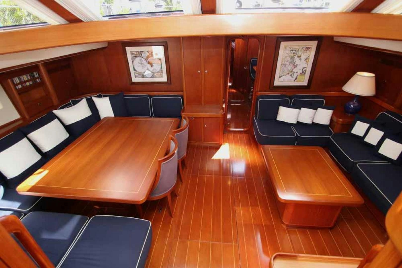 a room with a couch and a table aboard MAYA RAY Yacht for Sale