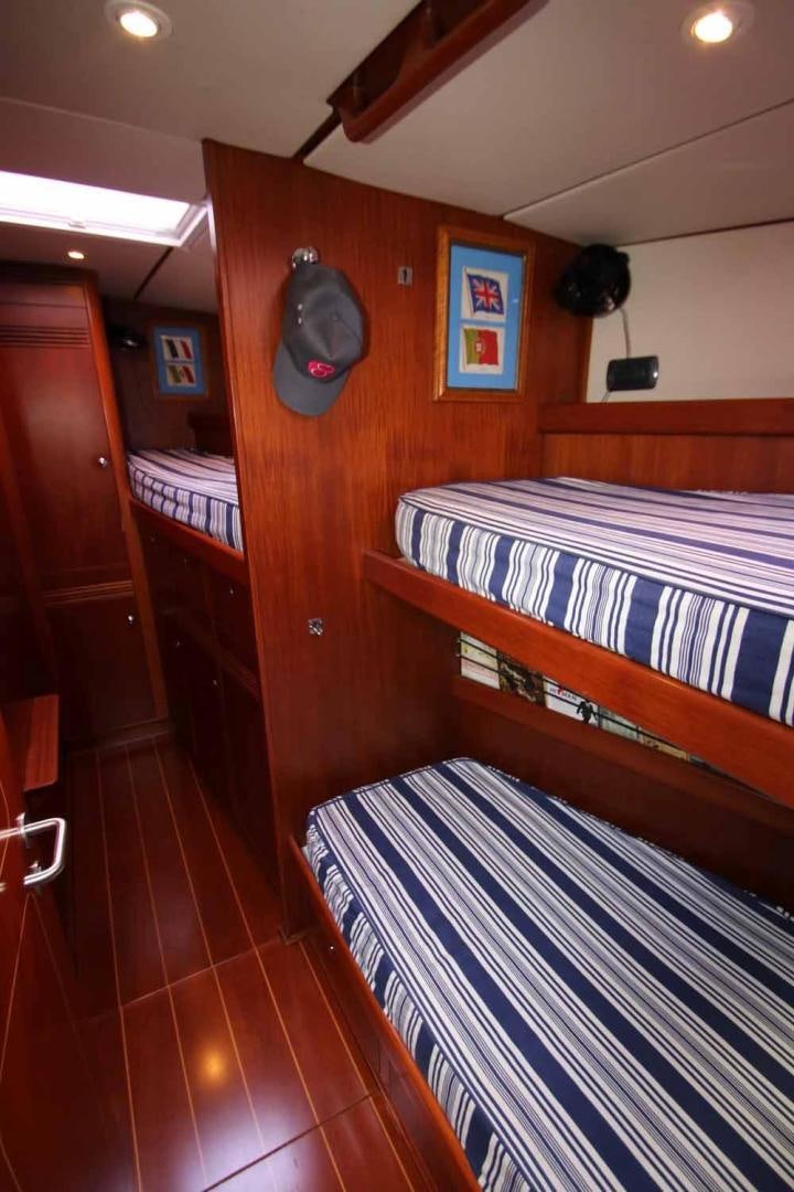 a room with bunk beds aboard MAYA RAY Yacht for Sale