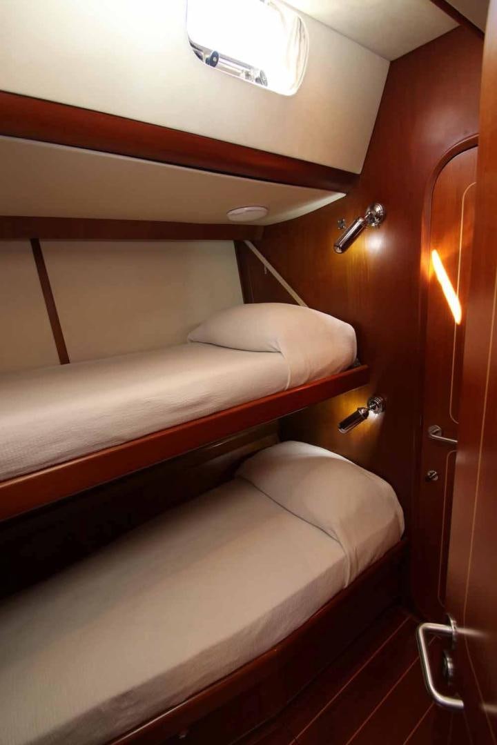 a room with two beds aboard MAYA RAY Yacht for Sale