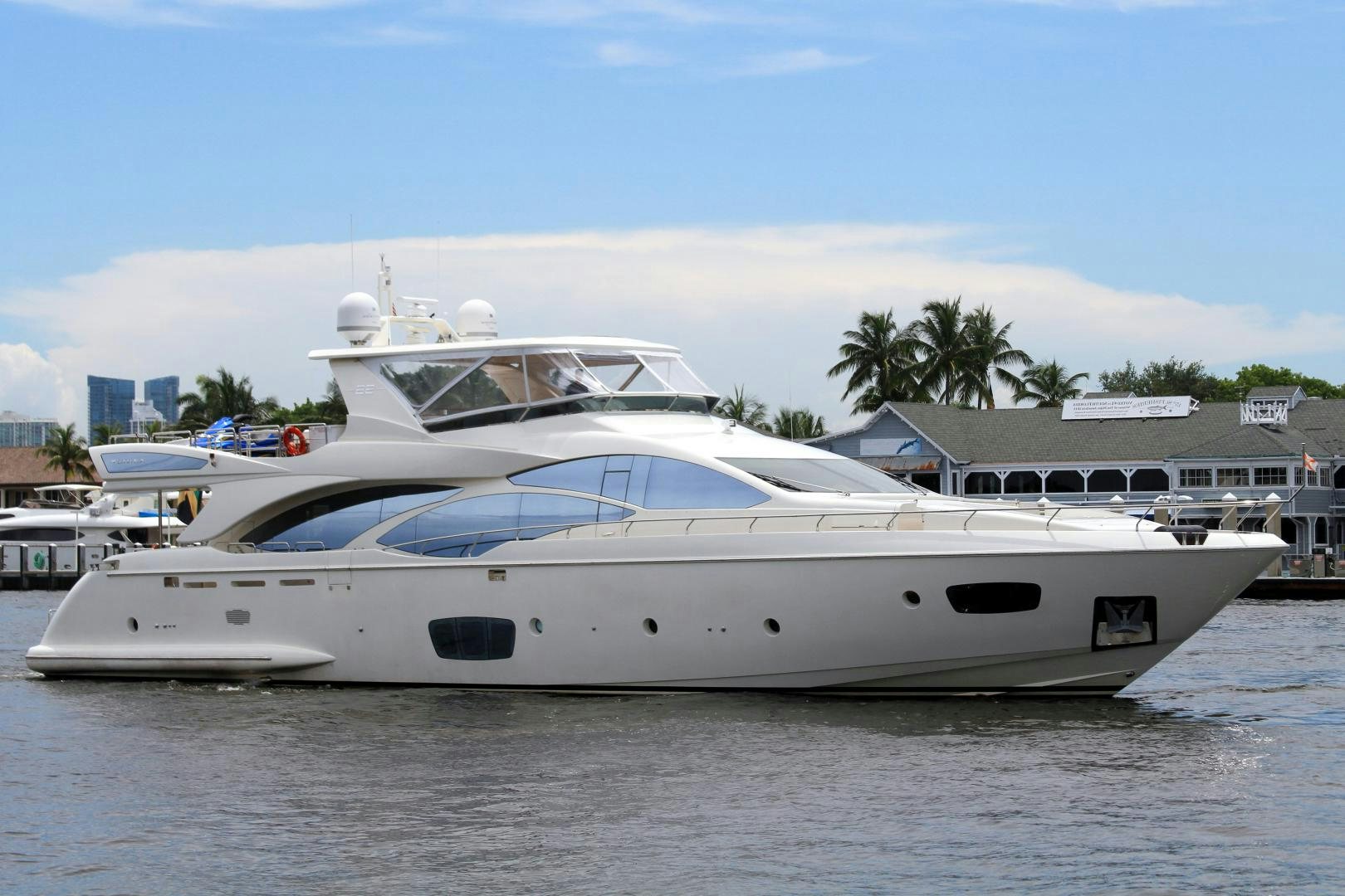 a white yacht in the water aboard SORRIDENTE Yacht for Sale