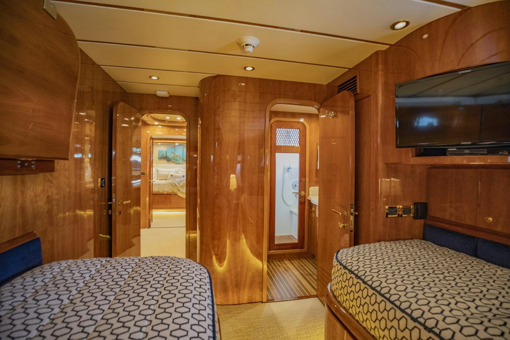 a room with a bed and a tv aboard FLY BOYS Yacht for Sale