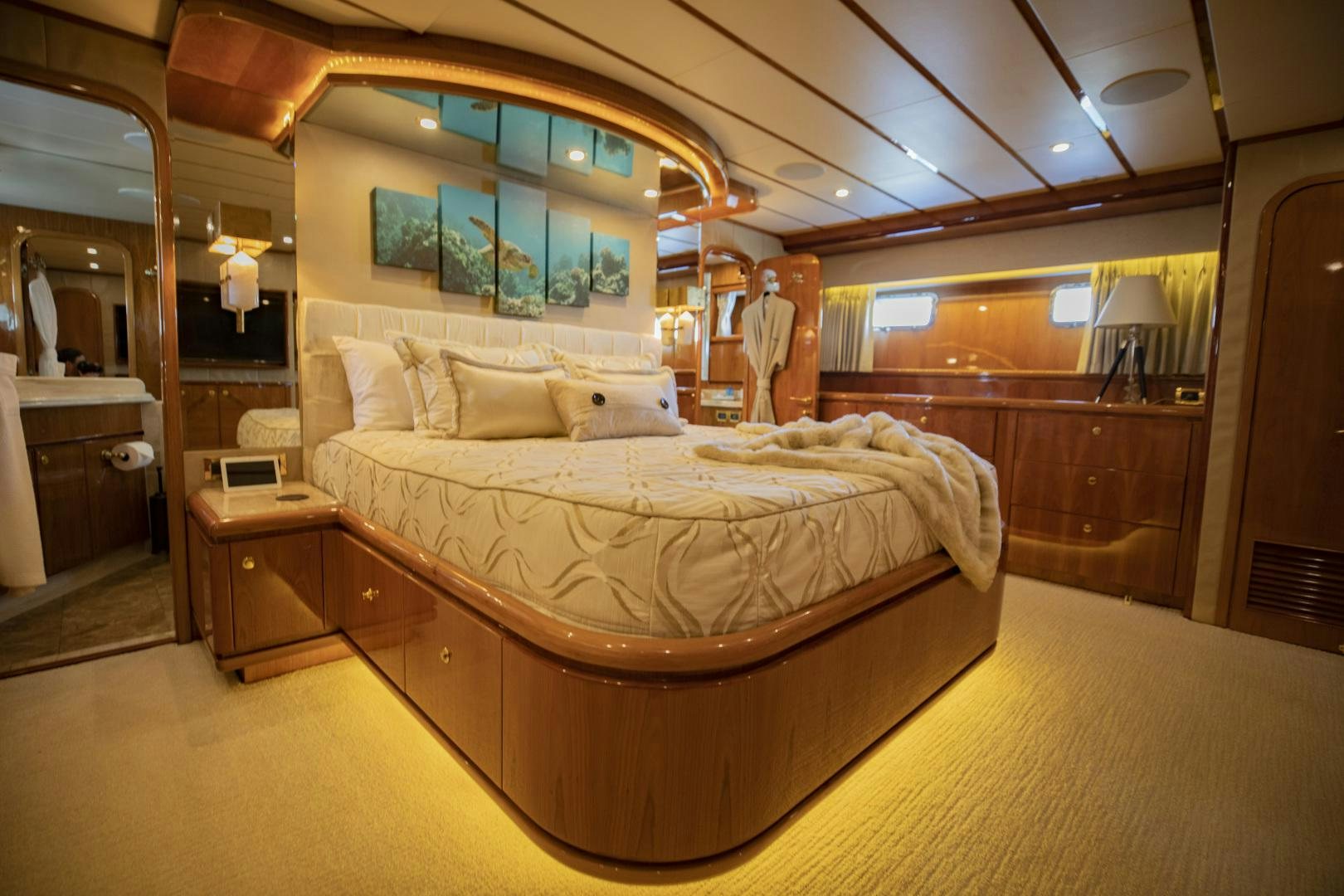 a large bed in a room aboard FLY BOYS Yacht for Sale