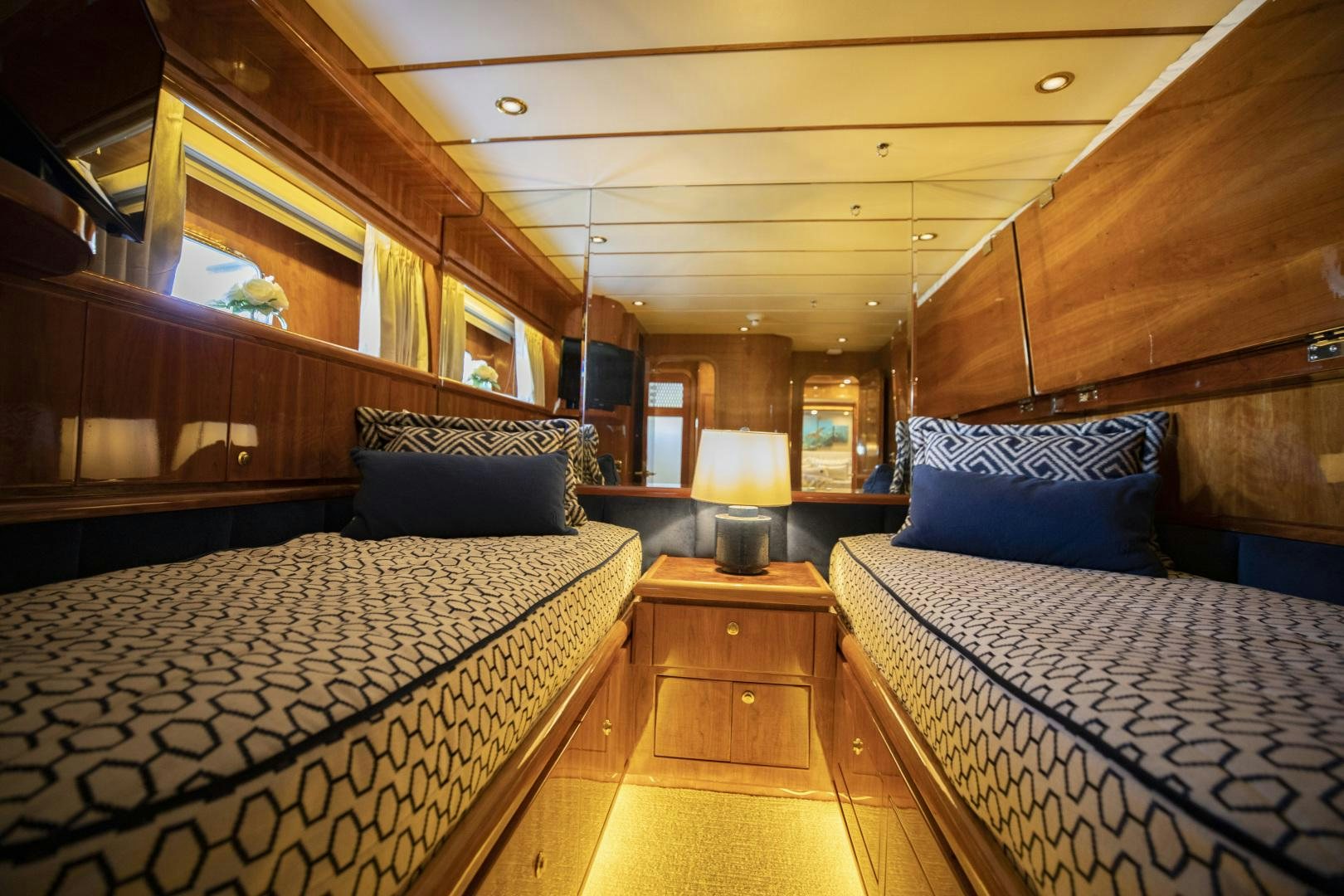 a room with two beds aboard FLY BOYS Yacht for Sale