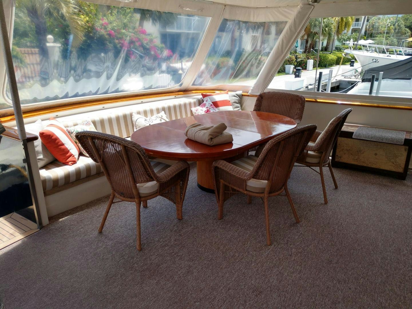 a table and chairs in a room aboard CAROLE TOO Yacht for Sale