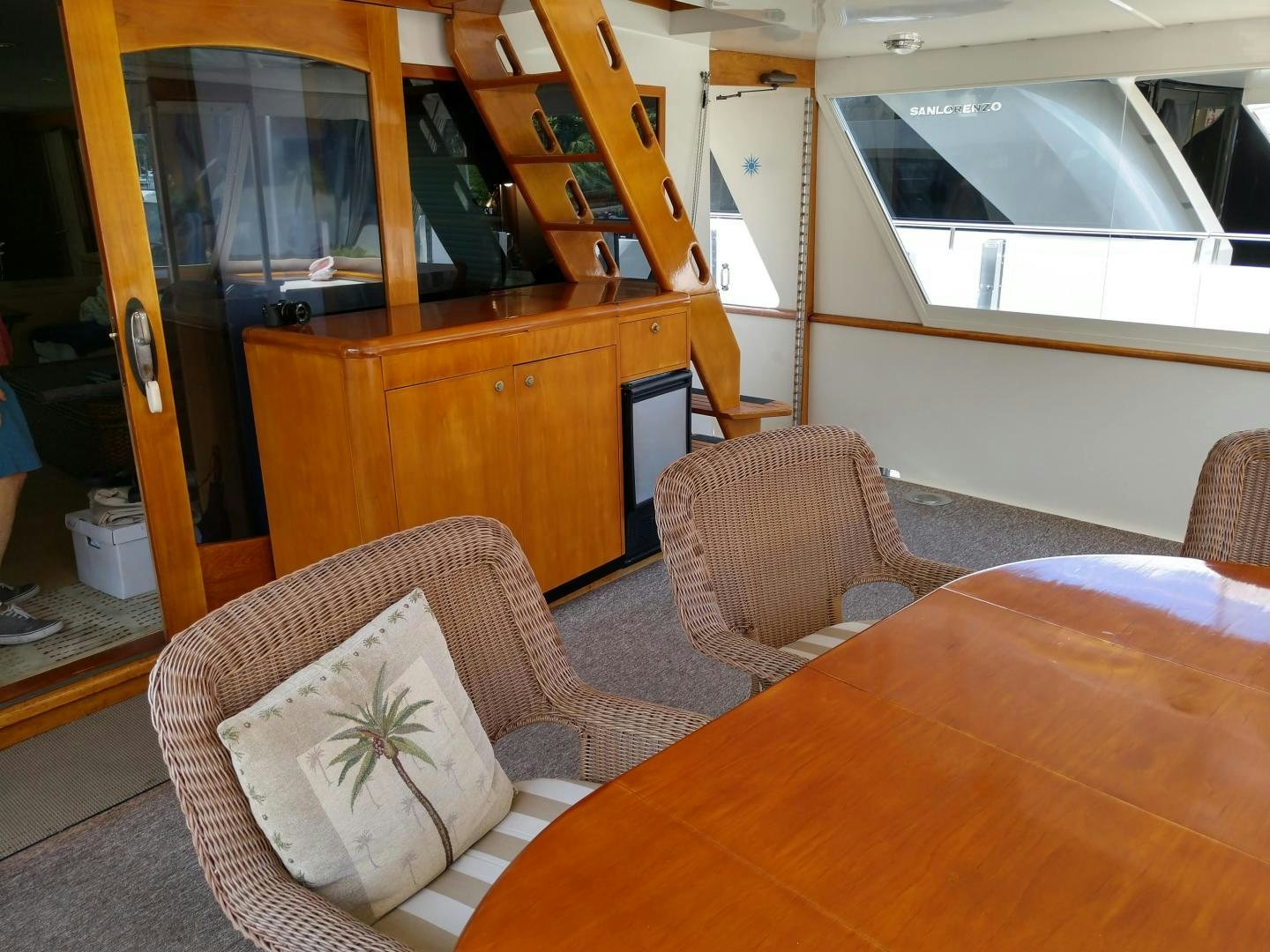 a living room with a couch and a table aboard CAROLE TOO Yacht for Sale