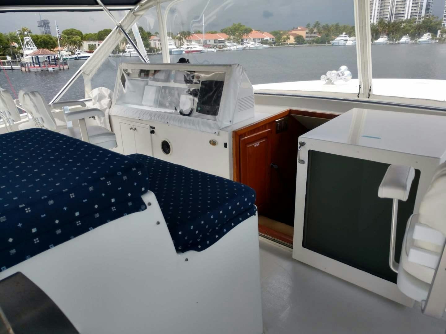 a boat on a deck aboard CAROLE TOO Yacht for Sale
