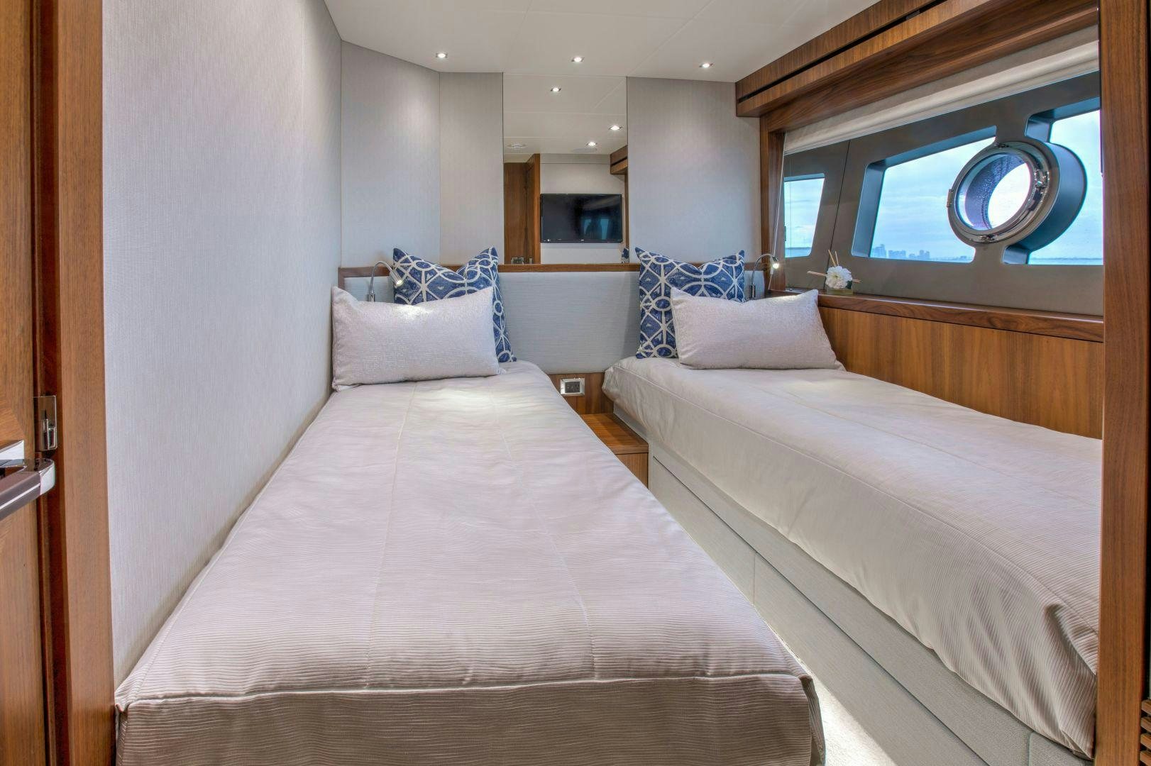a room with two beds aboard PERSEVERANCE 3 Yacht for Sale