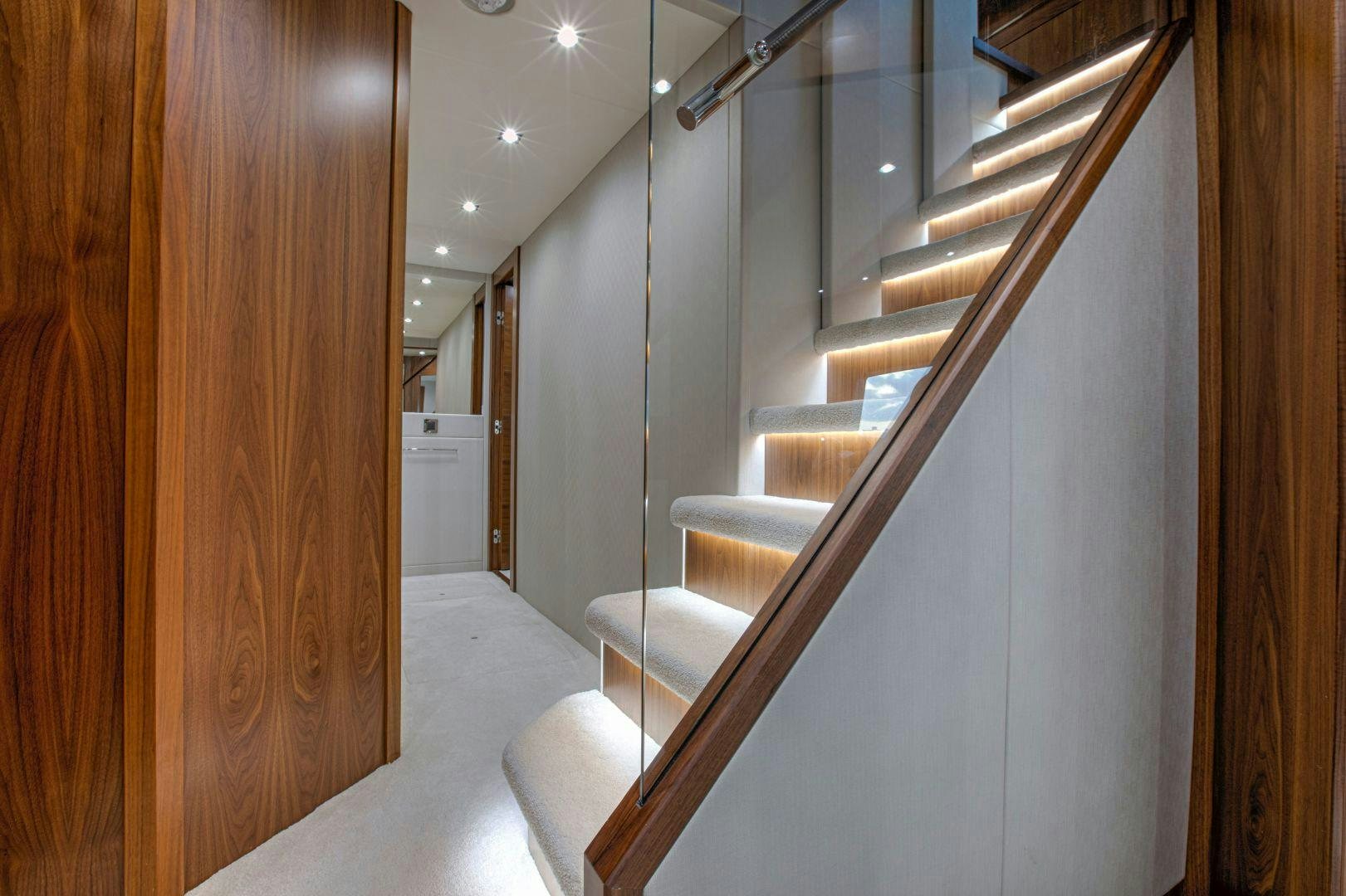 a hallway with wooden cabinets aboard PERSEVERANCE 3 Yacht for Sale