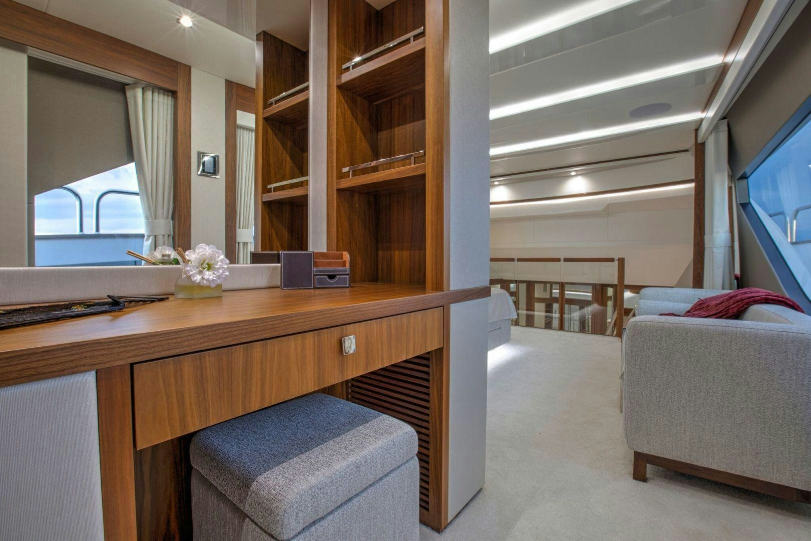 a room with a desk and a bed aboard PERSEVERANCE 3 Yacht for Sale