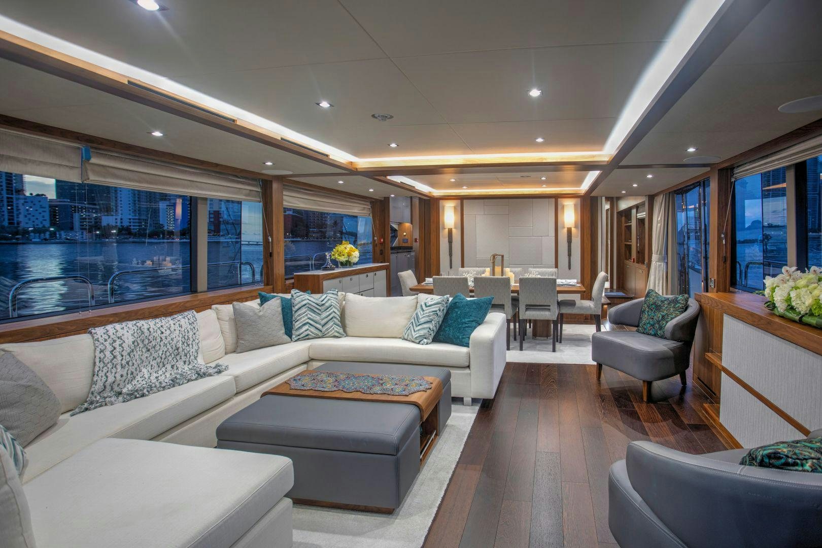 a living room with a large window aboard PERSEVERANCE 3 Yacht for Sale