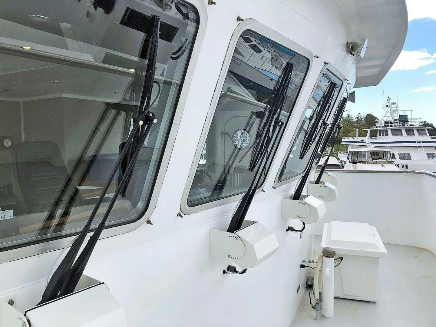 a white machine on a white surface aboard CARE BEAR Yacht for Sale