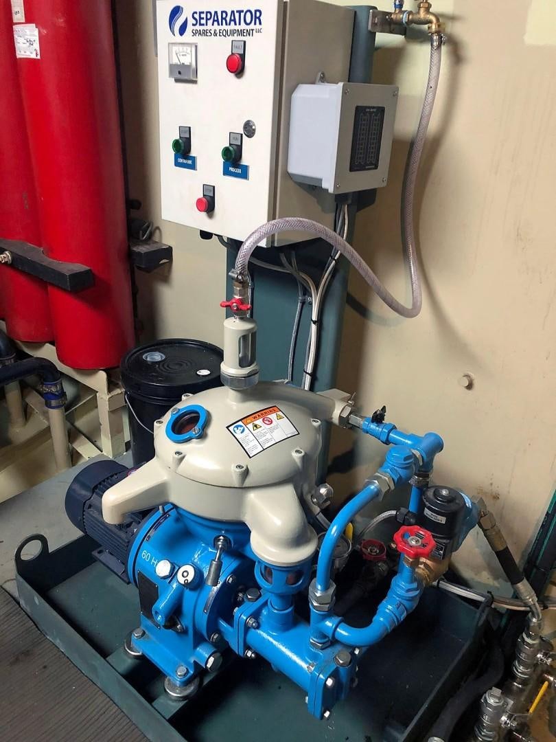 a machine with a blue handle aboard CARE BEAR Yacht for Sale