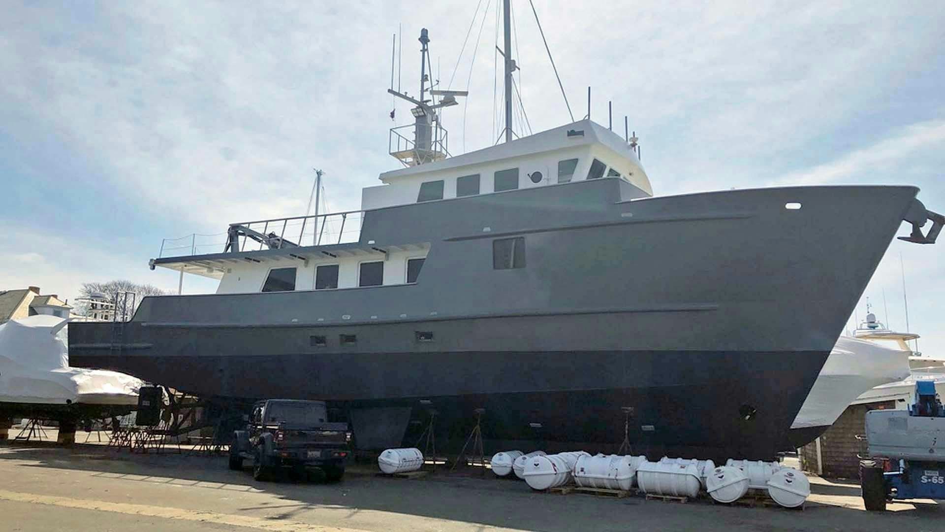 a large ship docked aboard CARE BEAR Yacht for Sale