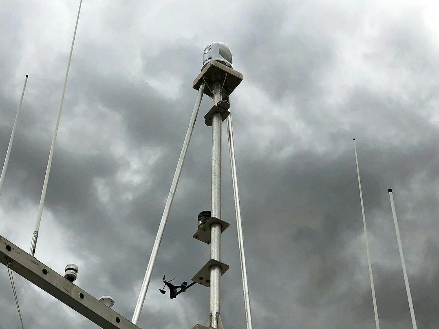 a person on a pole aboard CARE BEAR Yacht for Sale