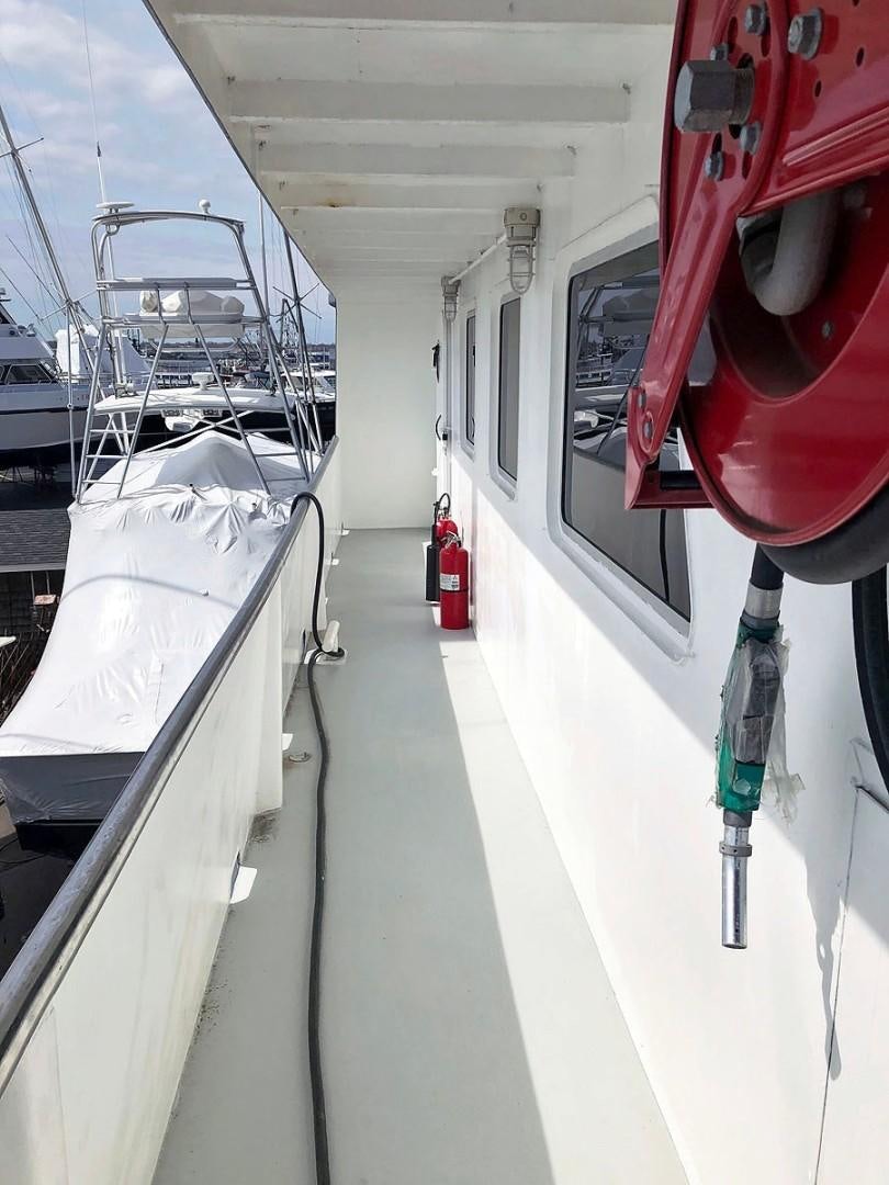 a boat in a garage aboard CARE BEAR Yacht for Sale