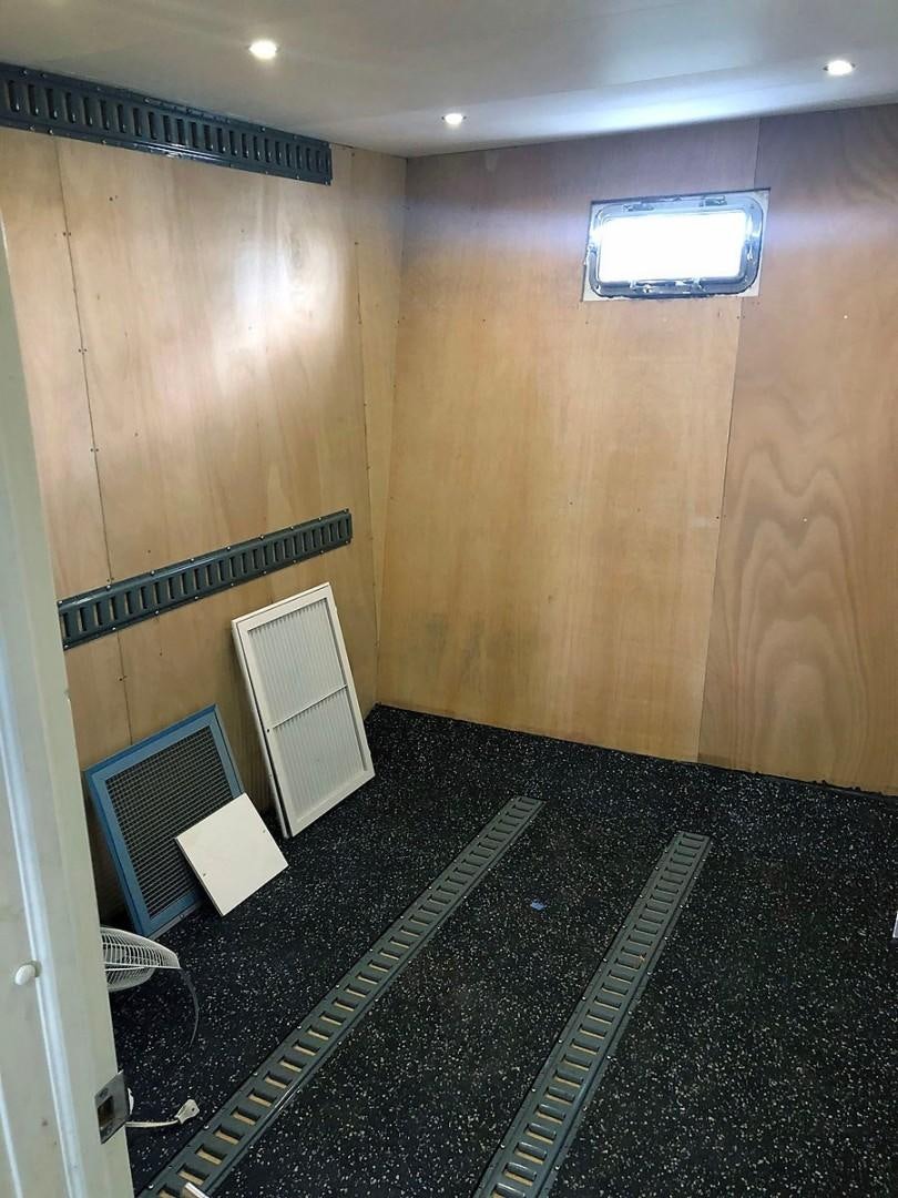 a computer tower in a room aboard CARE BEAR Yacht for Sale