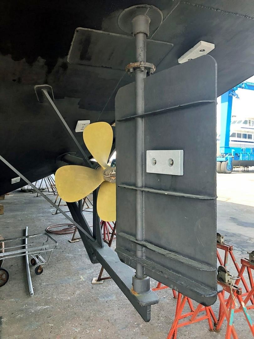 a machine with a large metal object aboard CARE BEAR Yacht for Sale