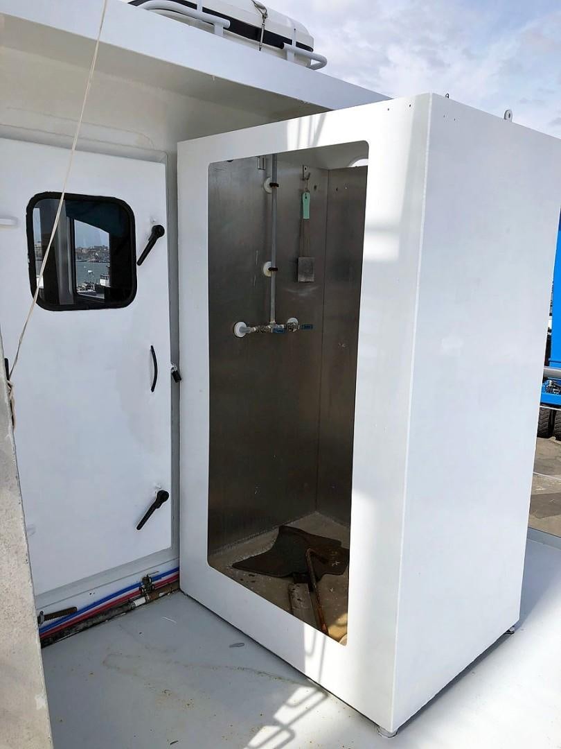 a large metal machine aboard CARE BEAR Yacht for Sale