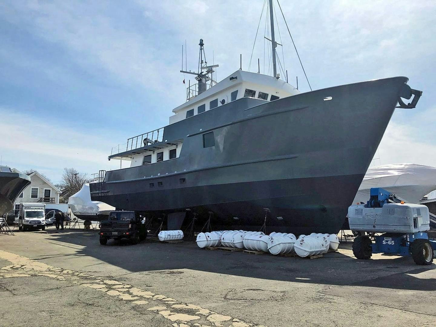 a large ship docked aboard CARE BEAR Yacht for Sale