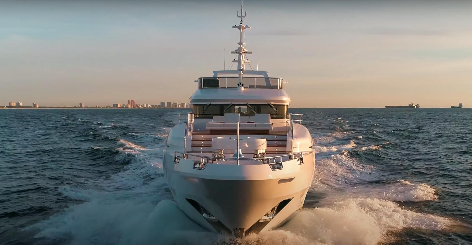 a boat on the water aboard Benetti 95 Delfino Yacht for Sale