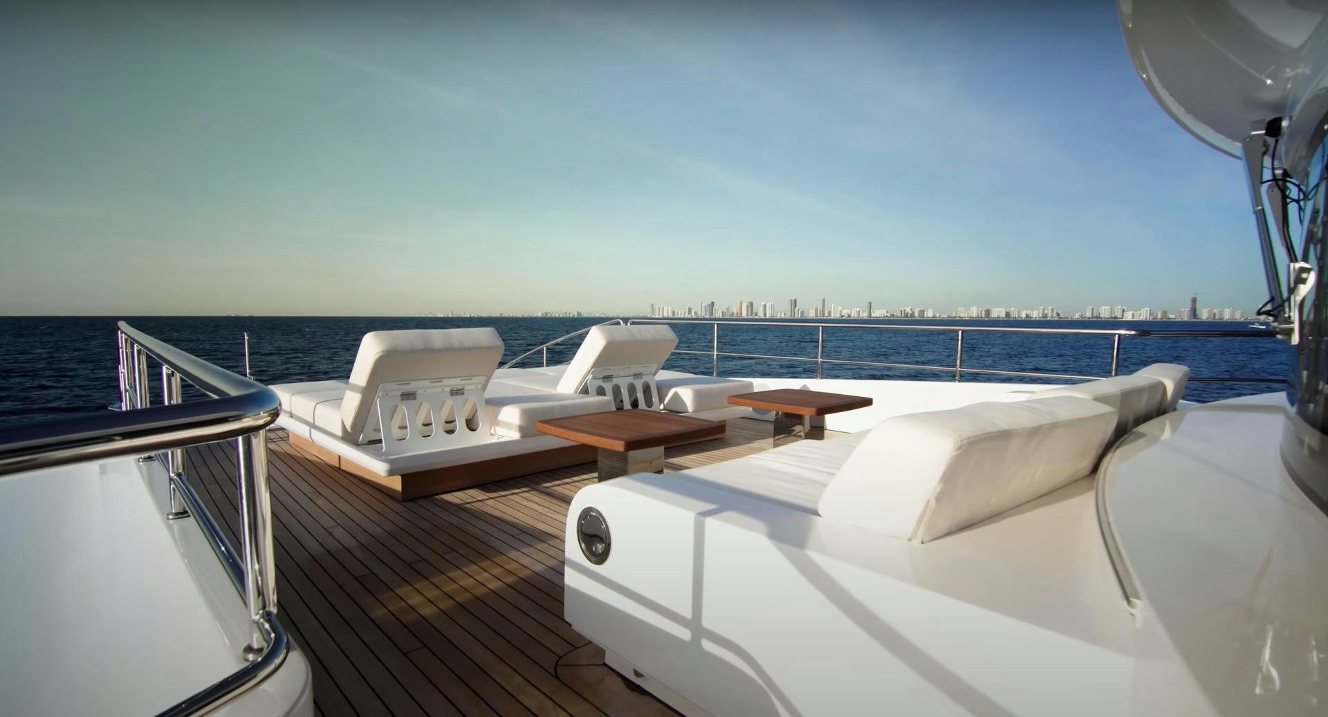 a boat on a deck aboard Benetti 95 Delfino Yacht for Sale