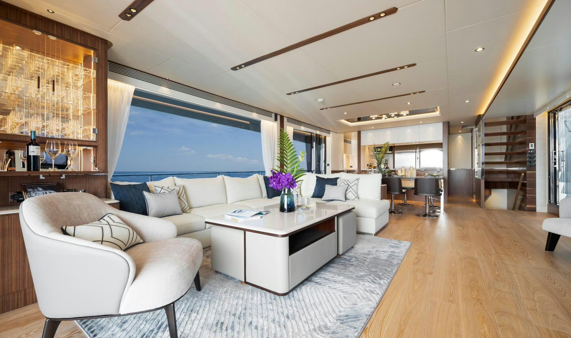 a living room with a large window aboard FD92 219 Yacht for Sale
