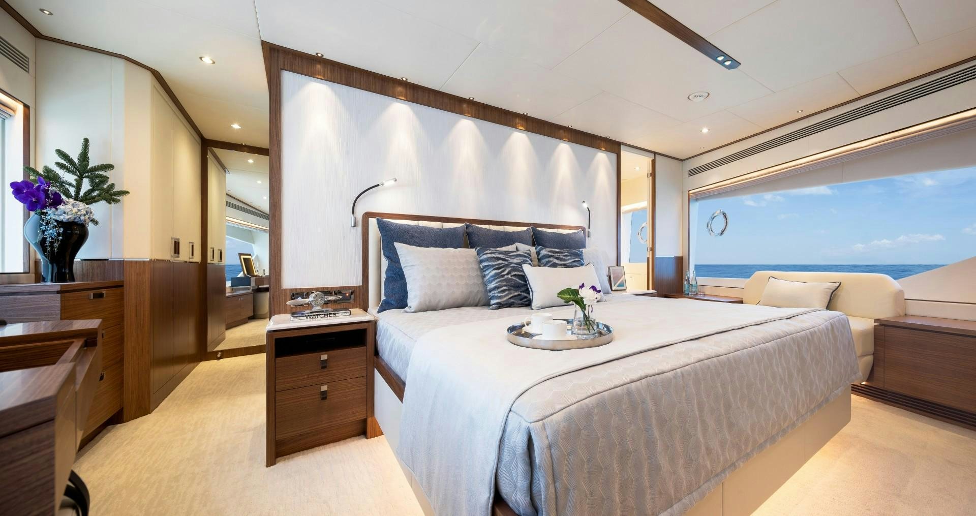 a bed with a white bed spread aboard FD92 219 Yacht for Sale