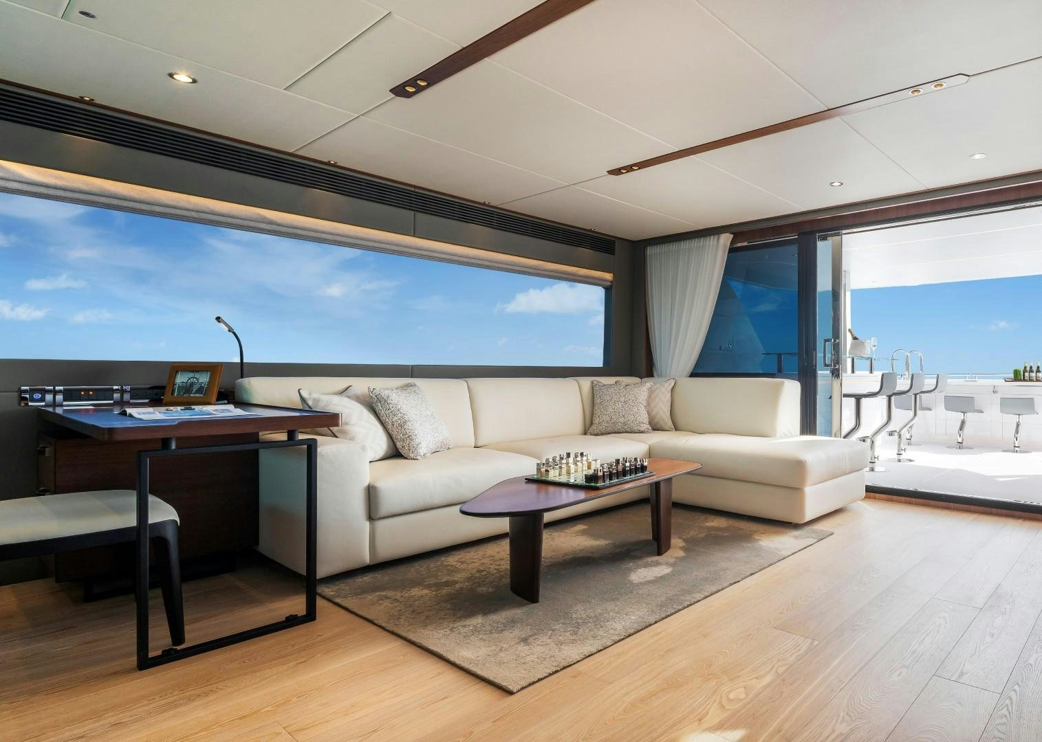 a living room with a couch and a table aboard FD92 219 Yacht for Sale